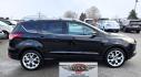 2013 Black /Black Ford Escape Titanium 4WD (1FMCU9J91DU) with an 2.0L L4 DOHC 16V engine, 6-Speed Automatic transmission, located at 450 N Russell, Missoula, MT, 59801, (406) 543-6600, 46.874496, -114.017433 - Cute AWD SUV. 2.0L I4 Engine runs Amazing! Huge Panoramic Sunroof. Navigation. Heated Leather Front Seats. AM FM CD Player with Bluetooth Audio and Phone Connectivity. Backup Camera. Power Lift Gate. Remote Start. Clean Title and Carfax. We Finance through local Credit Unions. We do NOT offer In - Photo#5