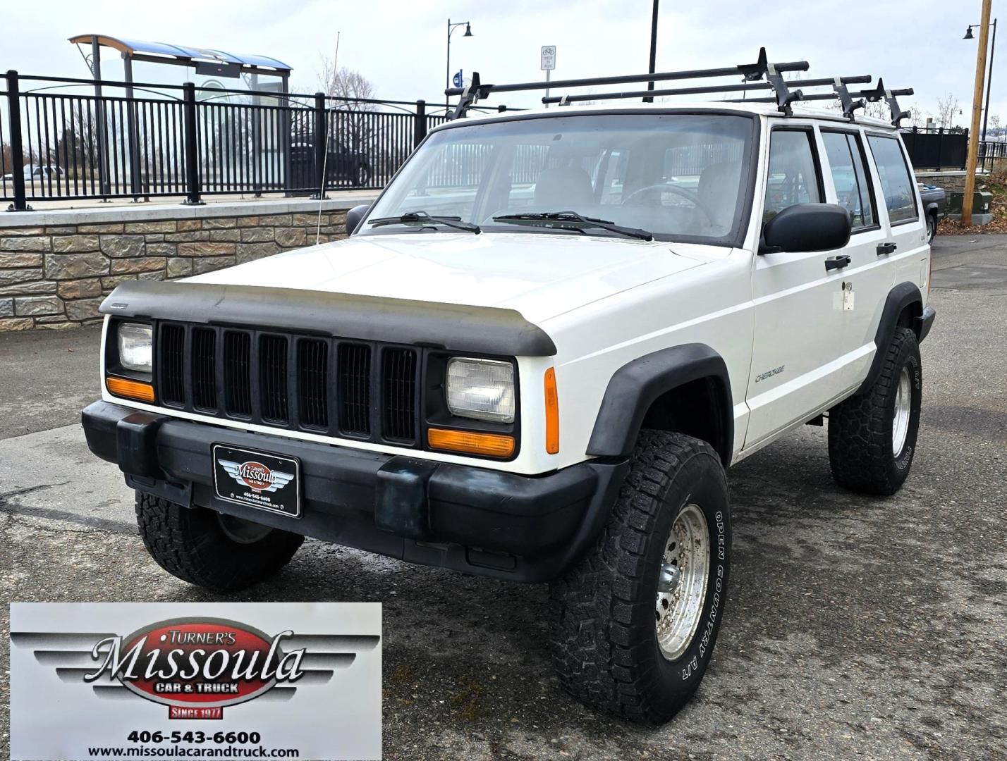 1999 White /Tan Jeep Cherokee SE 4-Door 4WD (1J4FF28S9XL) with an 4.0L L6 OHV 12V engine, Automatic transmission, located at 450 N Russell, Missoula, MT, 59801, (406) 543-6600, 46.874496, -114.017433 - 4WD Jeep Cherokee with the almost bullet proof 4.0L Straight Six Engine. Excellent Miles for the Year. Automatic Transmission. Air. Cruise. Tilt. Roof Rack. Nice Wheels. Does have the clear coat peeling on the passenger side. Because of the age, our lenders do not offer financing on this vehicle. - Photo#2