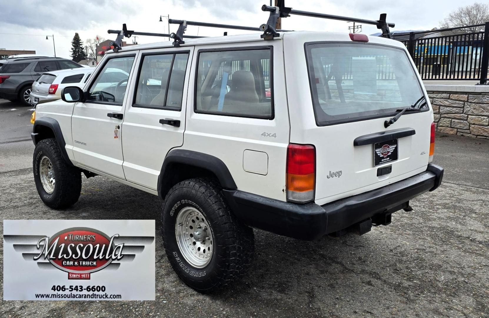 1999 White /Tan Jeep Cherokee SE 4-Door 4WD (1J4FF28S9XL) with an 4.0L L6 OHV 12V engine, Automatic transmission, located at 450 N Russell, Missoula, MT, 59801, (406) 543-6600, 46.874496, -114.017433 - 4WD Jeep Cherokee with the almost bullet proof 4.0L Straight Six Engine. Excellent Miles for the Year. Automatic Transmission. Air. Cruise. Tilt. Roof Rack. Nice Wheels. Does have the clear coat peeling on the passenger side. Because of the age, our lenders do not offer financing on this vehicle. - Photo#3