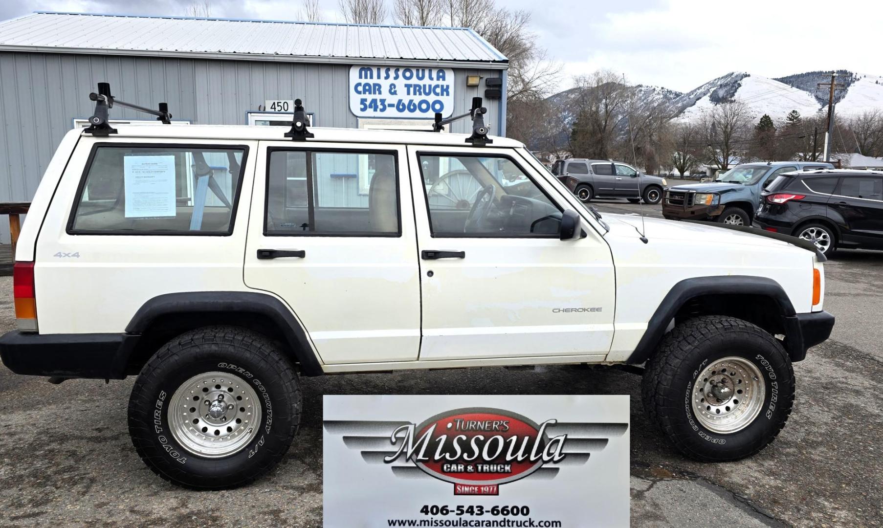 1999 White /Tan Jeep Cherokee SE 4-Door 4WD (1J4FF28S9XL) with an 4.0L L6 OHV 12V engine, Automatic transmission, located at 450 N Russell, Missoula, MT, 59801, (406) 543-6600, 46.874496, -114.017433 - 4WD Jeep Cherokee with the almost bullet proof 4.0L Straight Six Engine. Excellent Miles for the Year. Automatic Transmission. Air. Cruise. Tilt. Roof Rack. Nice Wheels. Does have the clear coat peeling on the passenger side. Because of the age, our lenders do not offer financing on this vehicle. - Photo#6