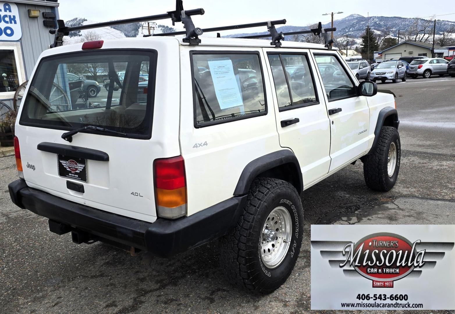 1999 White /Tan Jeep Cherokee SE 4-Door 4WD (1J4FF28S9XL) with an 4.0L L6 OHV 12V engine, Automatic transmission, located at 450 N Russell, Missoula, MT, 59801, (406) 543-6600, 46.874496, -114.017433 - 4WD Jeep Cherokee with the almost bullet proof 4.0L Straight Six Engine. Excellent Miles for the Year. Automatic Transmission. Air. Cruise. Tilt. Roof Rack. Nice Wheels. Does have the clear coat peeling on the passenger side. Because of the age, our lenders do not offer financing on this vehicle. - Photo#5