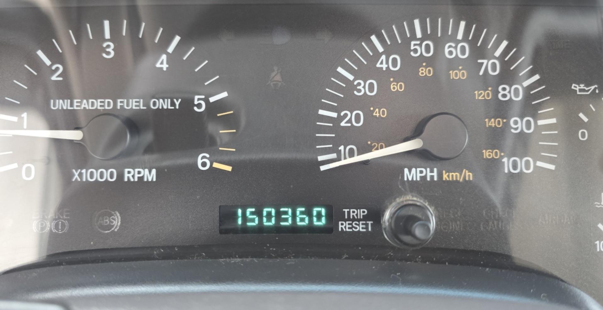 1999 White /Tan Jeep Cherokee SE 4-Door 4WD (1J4FF28S9XL) with an 4.0L L6 OHV 12V engine, Automatic transmission, located at 450 N Russell, Missoula, MT, 59801, (406) 543-6600, 46.874496, -114.017433 - 4WD Jeep Cherokee with the almost bullet proof 4.0L Straight Six Engine. Excellent Miles for the Year. Automatic Transmission. Air. Cruise. Tilt. Roof Rack. Nice Wheels. Does have the clear coat peeling on the passenger side. Because of the age, our lenders do not offer financing on this vehicle. - Photo#19