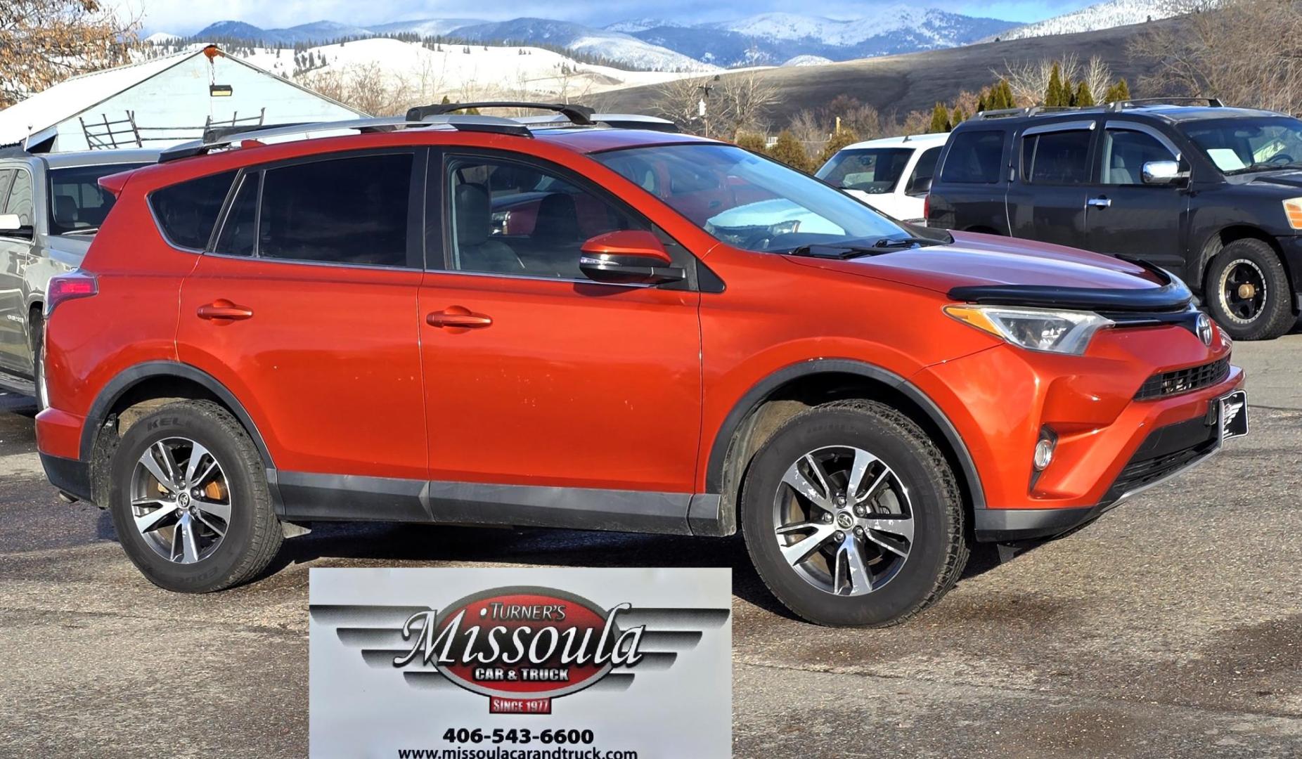 2016 Orange /Black Toyota RAV4 XLE AWD (2T3RFREV1GW) with an 2.5L L4 DOHC 16V engine, 6A transmission, located at 450 N Russell, Missoula, MT, 59801, (406) 543-6600, 46.874496, -114.017433 - Photo#2