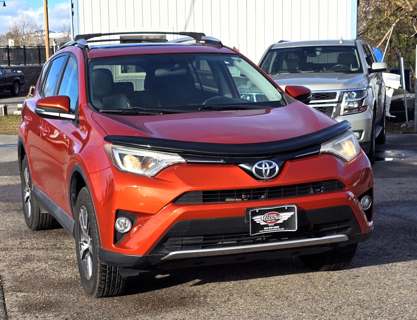 2016 Orange /Black Toyota RAV4 XLE AWD (2T3RFREV1GW) with an 2.5L L4 DOHC 16V engine, 6A transmission, located at 450 N Russell, Missoula, MT, 59801, (406) 543-6600, 46.874496, -114.017433 - Photo#3