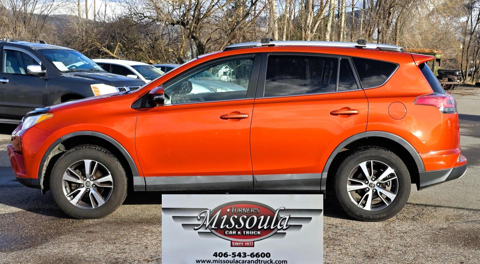 2016 Orange /Black Toyota RAV4 XLE AWD (2T3RFREV1GW) with an 2.5L L4 DOHC 16V engine, 6A transmission, located at 450 N Russell, Missoula, MT, 59801, (406) 543-6600, 46.874496, -114.017433 - Photo#5