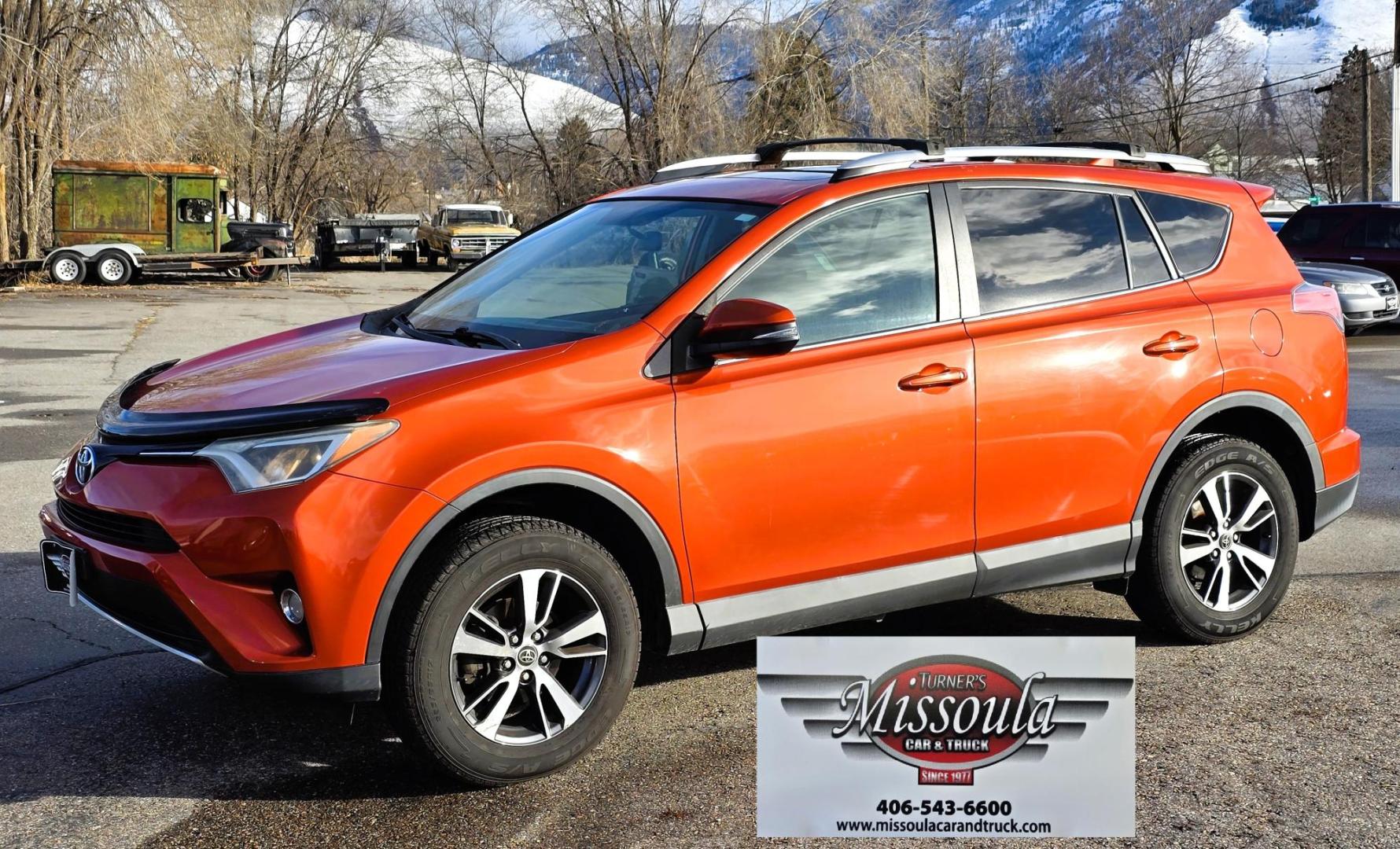 2016 Orange /Black Toyota RAV4 XLE AWD (2T3RFREV1GW) with an 2.5L L4 DOHC 16V engine, 6A transmission, located at 450 N Russell, Missoula, MT, 59801, (406) 543-6600, 46.874496, -114.017433 - Photo#6