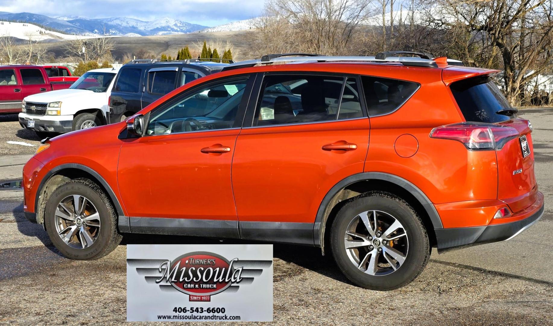 2016 Orange /Black Toyota RAV4 XLE AWD (2T3RFREV1GW) with an 2.5L L4 DOHC 16V engine, 6A transmission, located at 450 N Russell, Missoula, MT, 59801, (406) 543-6600, 46.874496, -114.017433 - Photo#7