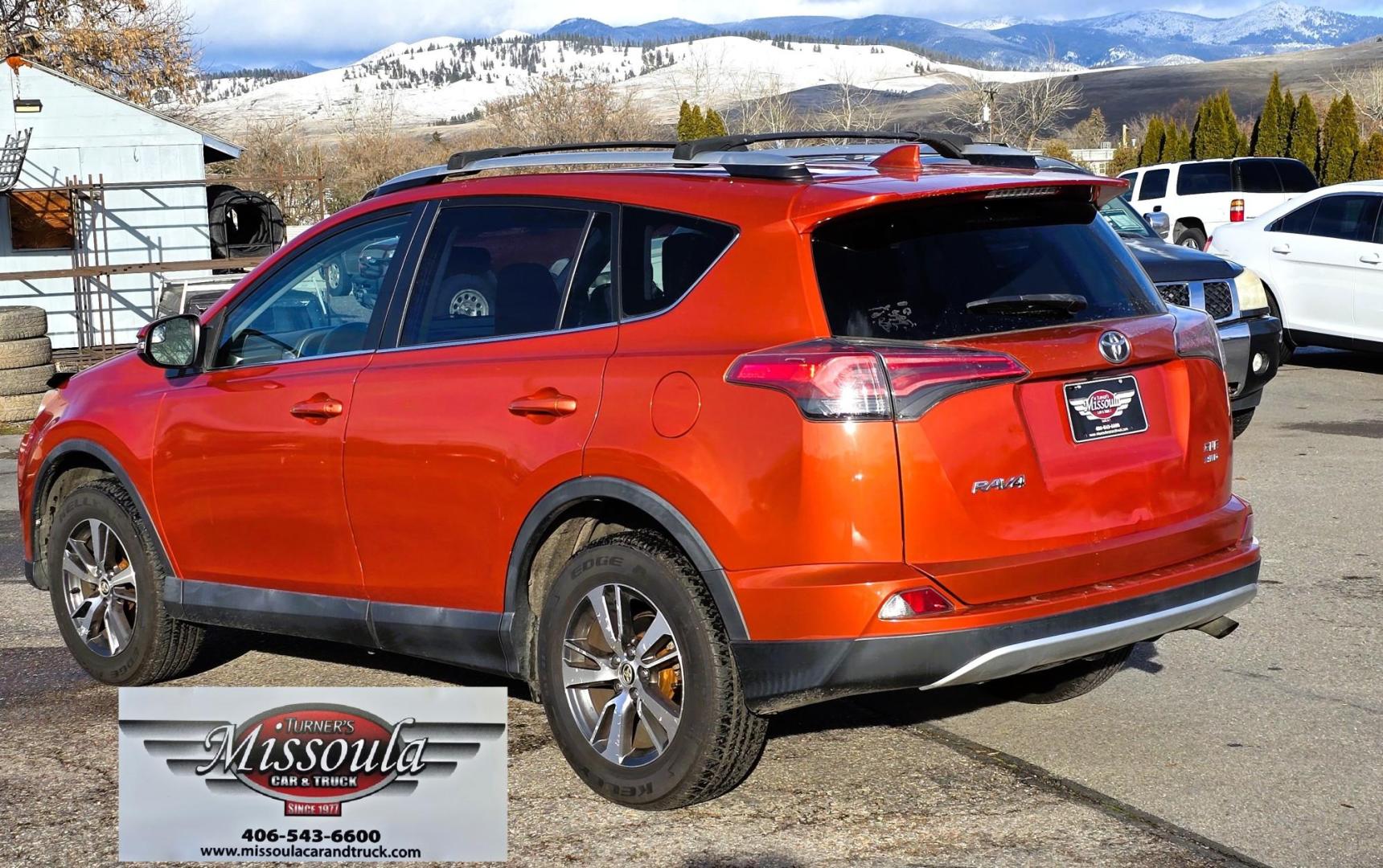 2016 Orange /Black Toyota RAV4 XLE AWD (2T3RFREV1GW) with an 2.5L L4 DOHC 16V engine, 6A transmission, located at 450 N Russell, Missoula, MT, 59801, (406) 543-6600, 46.874496, -114.017433 - Photo#8