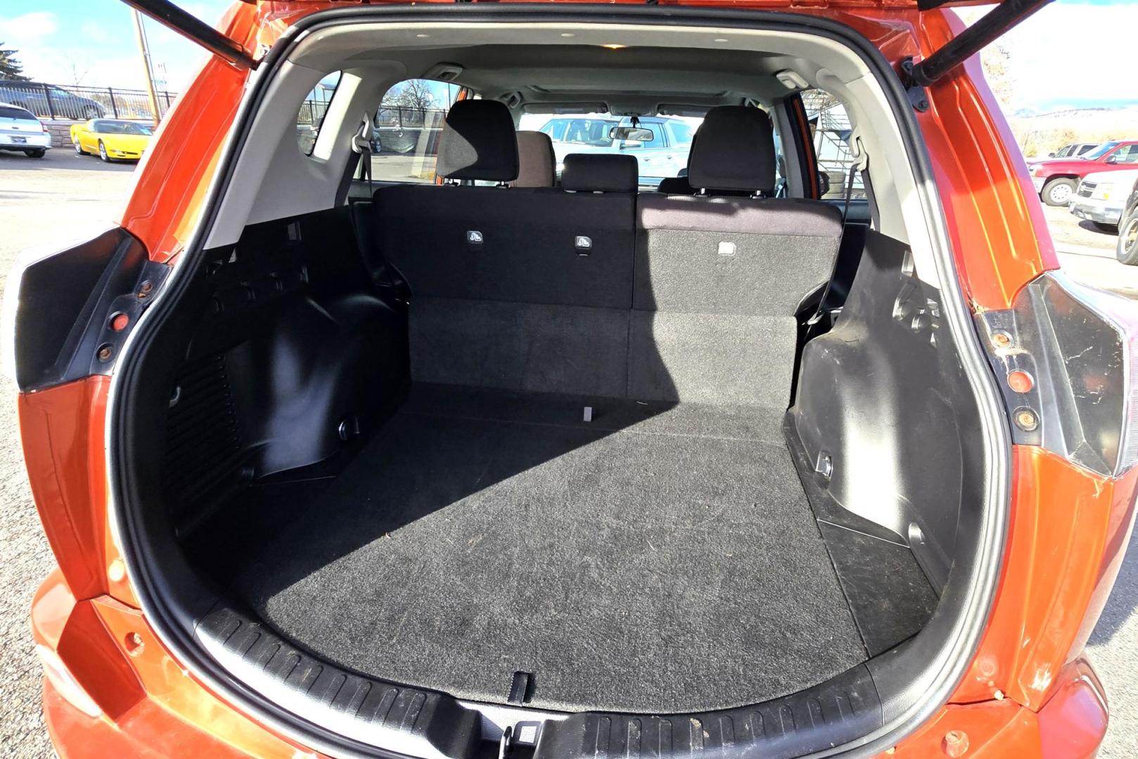 2016 Orange /Black Toyota RAV4 XLE AWD (2T3RFREV1GW) with an 2.5L L4 DOHC 16V engine, 6A transmission, located at 450 N Russell, Missoula, MT, 59801, (406) 543-6600, 46.874496, -114.017433 - Photo#10