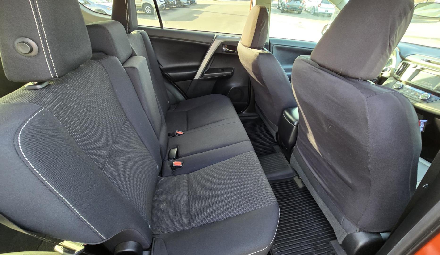 2016 Orange /Black Toyota RAV4 XLE AWD (2T3RFREV1GW) with an 2.5L L4 DOHC 16V engine, 6A transmission, located at 450 N Russell, Missoula, MT, 59801, (406) 543-6600, 46.874496, -114.017433 - Photo#11