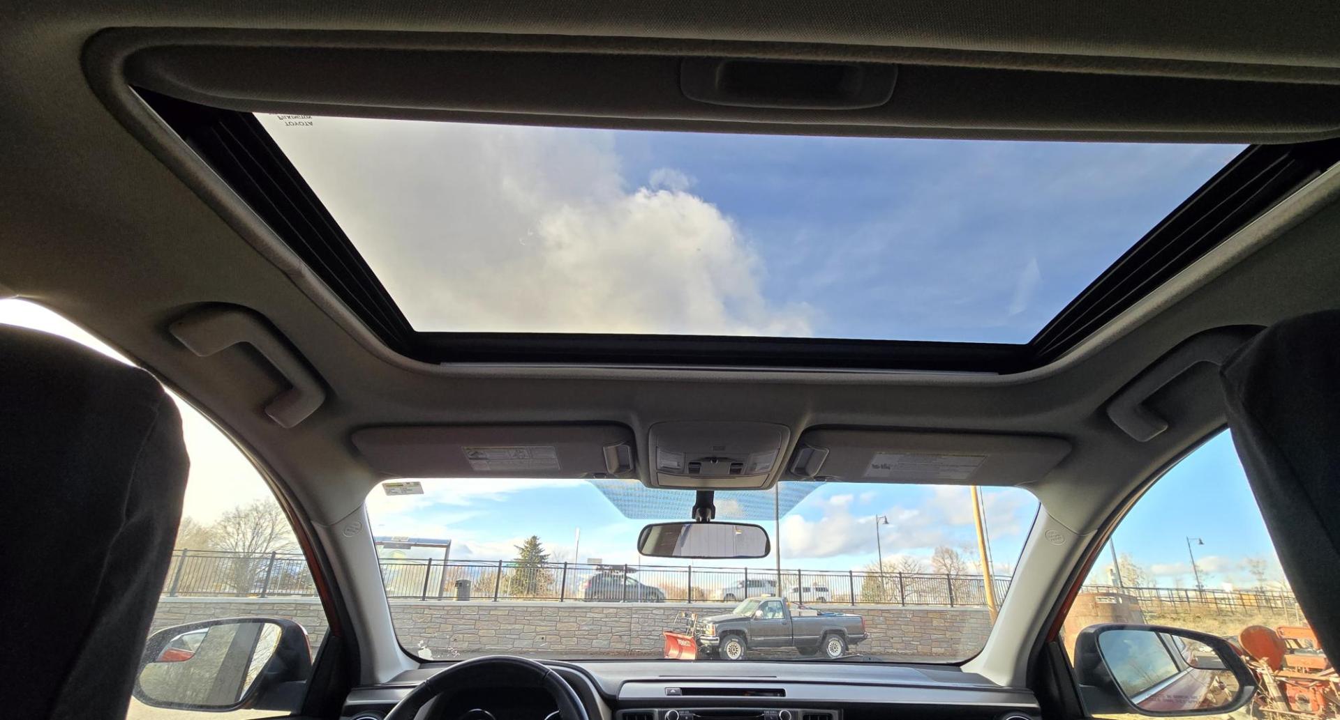 2016 Orange /Black Toyota RAV4 XLE AWD (2T3RFREV1GW) with an 2.5L L4 DOHC 16V engine, 6A transmission, located at 450 N Russell, Missoula, MT, 59801, (406) 543-6600, 46.874496, -114.017433 - Photo#16