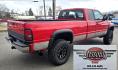 1998 Red /Blue Dodge Ram 2500 Quad Cab 6.5-ft. Bed 4WD (1B7KF2364WJ) with an 5.9L L6 OHV 24V TURBO DIESEL engine, 5 Speed Manual transmission, located at 450 N Russell, Missoula, MT, 59801, (406) 543-6600, 46.874496, -114.017433 - Highly Desirable 2nd Generation Dodge 3/4 Ton 4WD with a 24 Valve 5.9L Cummins Diesel Engine. Comes with a Rare 5 Speed Manual Transmission. Runs and Shits well. Air Conditioning. Nice Wheels and Tires. Box has a few dings and dents. Set up for a gooseneck ball. Because of the age, our lenders d - Photo#2
