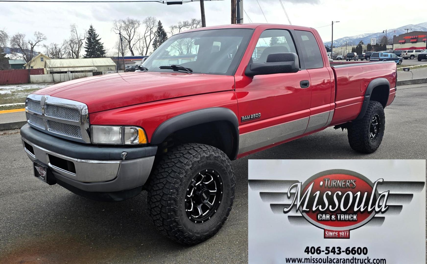 1998 Red /Blue Dodge Ram 2500 Quad Cab 6.5-ft. Bed 4WD (1B7KF2364WJ) with an 5.9L L6 OHV 24V TURBO DIESEL engine, 5 Speed Manual transmission, located at 450 N Russell, Missoula, MT, 59801, (406) 543-6600, 46.874496, -114.017433 - Highly Desirable 2nd Generation Dodge 3/4 Ton 4WD with a 24 Valve 5.9L Cummins Diesel Engine. Comes with a Rare 5 Speed Manual Transmission. Runs and Shits well. Air Conditioning. Nice Wheels and Tires. Box has a few dings and dents. Set up for a gooseneck ball. Because of the age, our lenders d - Photo#5