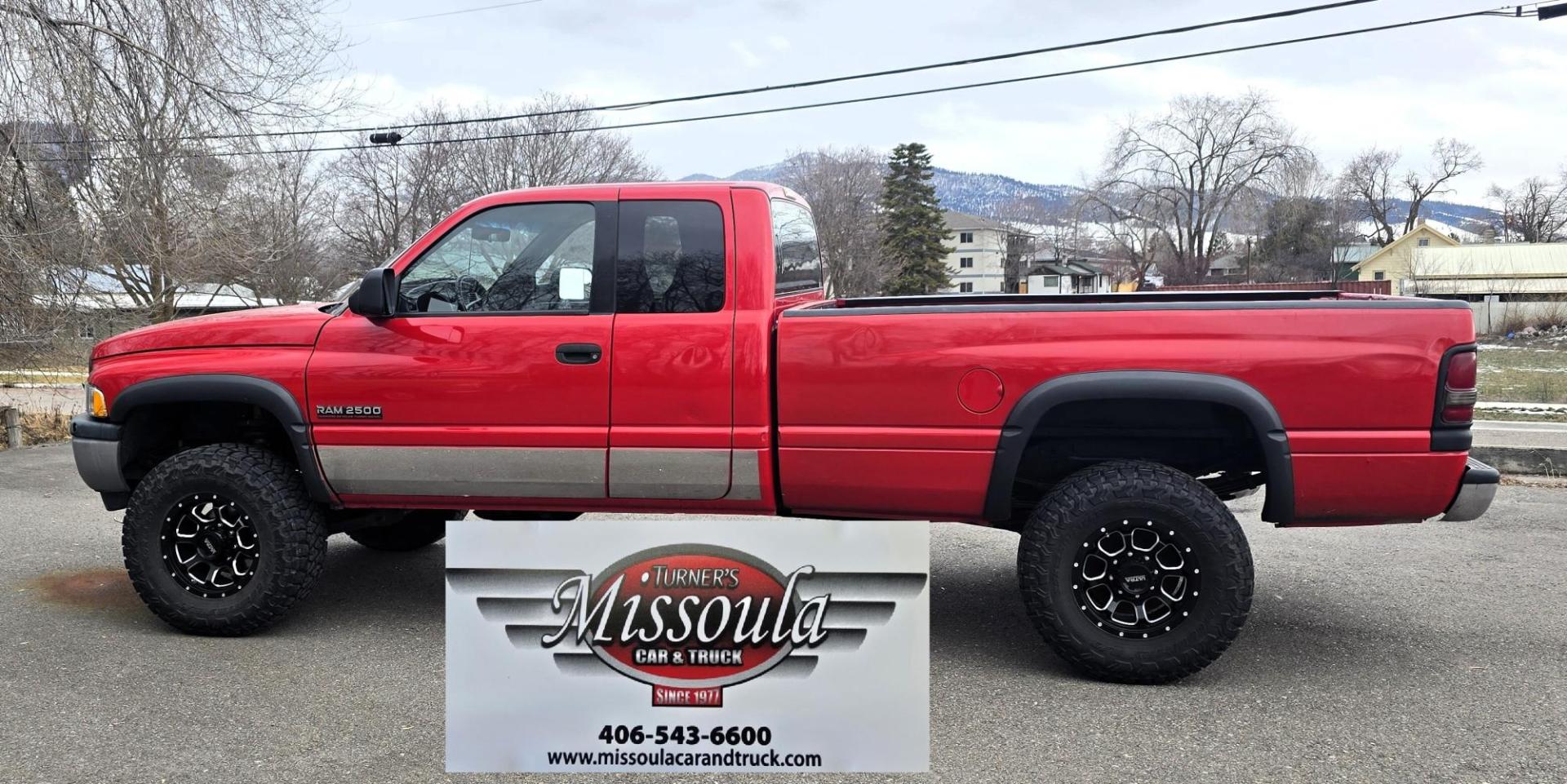 1998 Red /Blue Dodge Ram 2500 Quad Cab 6.5-ft. Bed 4WD (1B7KF2364WJ) with an 5.9L L6 OHV 24V TURBO DIESEL engine, 5 Speed Manual transmission, located at 450 N Russell, Missoula, MT, 59801, (406) 543-6600, 46.874496, -114.017433 - Highly Desirable 2nd Generation Dodge 3/4 Ton 4WD with a 24 Valve 5.9L Cummins Diesel Engine. Comes with a Rare 5 Speed Manual Transmission. Runs and Shits well. Air Conditioning. Nice Wheels and Tires. Box has a few dings and dents. Set up for a gooseneck ball. Because of the age, our lenders d - Photo#3