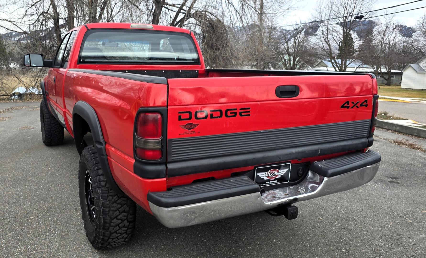 1998 Red /Blue Dodge Ram 2500 Quad Cab 6.5-ft. Bed 4WD (1B7KF2364WJ) with an 5.9L L6 OHV 24V TURBO DIESEL engine, 5 Speed Manual transmission, located at 450 N Russell, Missoula, MT, 59801, (406) 543-6600, 46.874496, -114.017433 - Highly Desirable 2nd Generation Dodge 3/4 Ton 4WD with a 24 Valve 5.9L Cummins Diesel Engine. Comes with a Rare 5 Speed Manual Transmission. Runs and Shits well. Air Conditioning. Nice Wheels and Tires. Box has a few dings and dents. Set up for a gooseneck ball. Because of the age, our lenders d - Photo#7