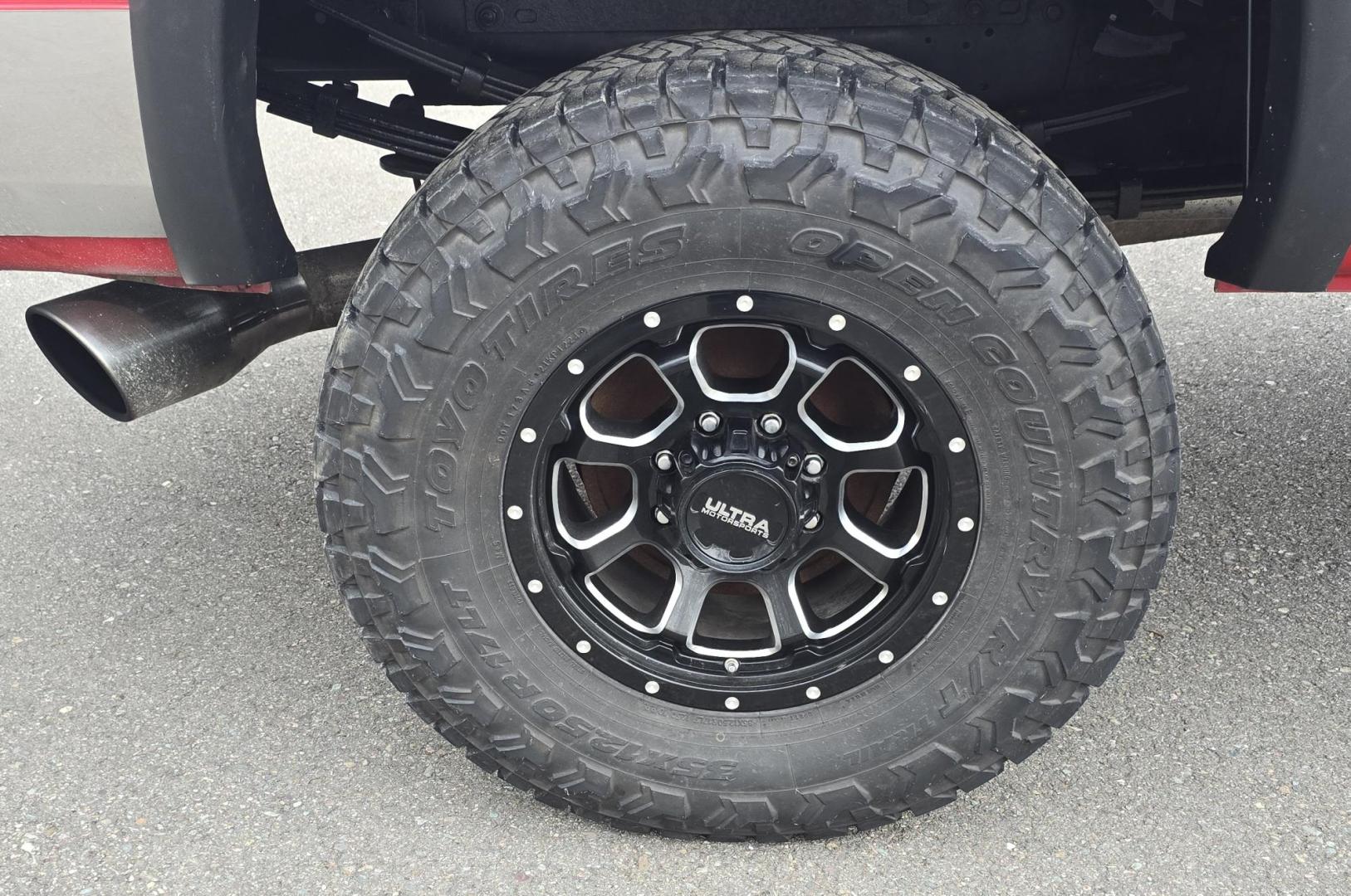 1998 Red /Blue Dodge Ram 2500 Quad Cab 6.5-ft. Bed 4WD (1B7KF2364WJ) with an 5.9L L6 OHV 24V TURBO DIESEL engine, 5 Speed Manual transmission, located at 450 N Russell, Missoula, MT, 59801, (406) 543-6600, 46.874496, -114.017433 - Highly Desirable 2nd Generation Dodge 3/4 Ton 4WD with a 24 Valve 5.9L Cummins Diesel Engine. Comes with a Rare 5 Speed Manual Transmission. Runs and Shits well. Air Conditioning. Nice Wheels and Tires. Box has a few dings and dents. Set up for a gooseneck ball. Because of the age, our lenders d - Photo#9