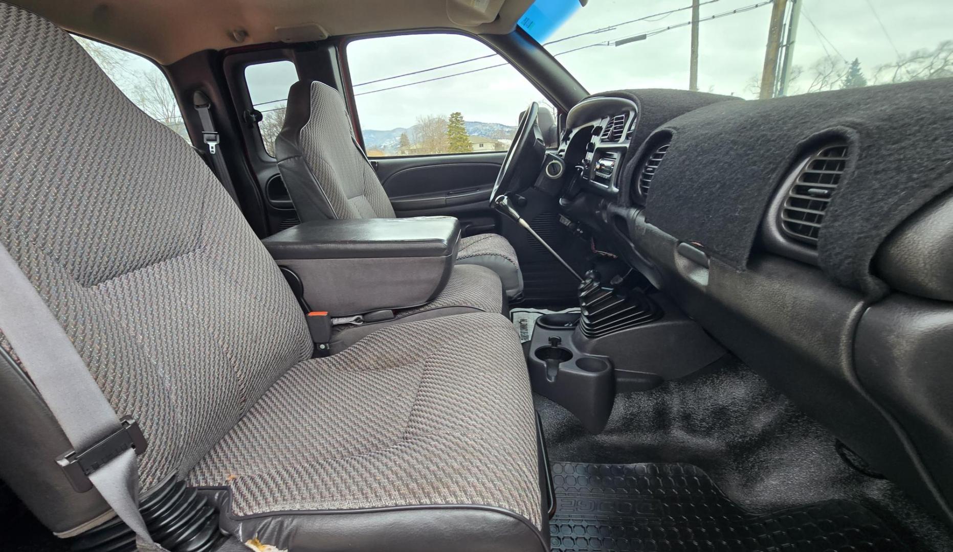 1998 Red /Blue Dodge Ram 2500 Quad Cab 6.5-ft. Bed 4WD (1B7KF2364WJ) with an 5.9L L6 OHV 24V TURBO DIESEL engine, 5 Speed Manual transmission, located at 450 N Russell, Missoula, MT, 59801, (406) 543-6600, 46.874496, -114.017433 - Highly Desirable 2nd Generation Dodge 3/4 Ton 4WD with a 24 Valve 5.9L Cummins Diesel Engine. Comes with a Rare 5 Speed Manual Transmission. Runs and Shits well. Air Conditioning. Nice Wheels and Tires. Box has a few dings and dents. Set up for a gooseneck ball. Because of the age, our lenders d - Photo#12