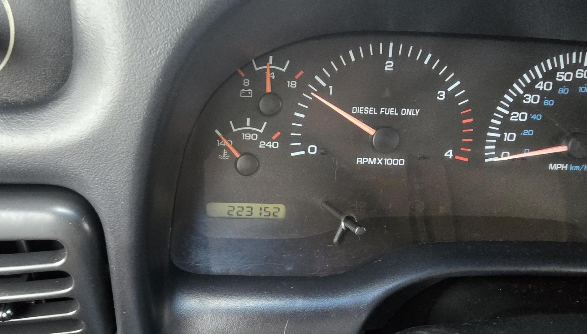 1998 Red /Blue Dodge Ram 2500 Quad Cab 6.5-ft. Bed 4WD (1B7KF2364WJ) with an 5.9L L6 OHV 24V TURBO DIESEL engine, 5 Speed Manual transmission, located at 450 N Russell, Missoula, MT, 59801, (406) 543-6600, 46.874496, -114.017433 - Highly Desirable 2nd Generation Dodge 3/4 Ton 4WD with a 24 Valve 5.9L Cummins Diesel Engine. Comes with a Rare 5 Speed Manual Transmission. Runs and Shits well. Air Conditioning. Nice Wheels and Tires. Box has a few dings and dents. Set up for a gooseneck ball. Because of the age, our lenders d - Photo#15