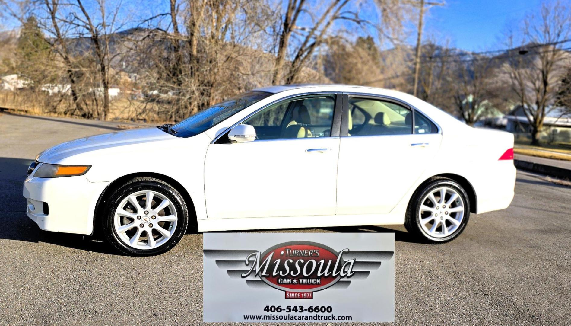 2006 White /Black Acura TSX 5-Speed AT (JH4CL96826C) with an 2.4L L4 DOHC 16V engine, 5-Speed Automatic Overdrive transmission, located at 450 N Russell, Missoula, MT, 59801, (406) 543-6600, 46.874496, -114.017433 - Very Clean Front Wheel Drive Sedan. Zippy 2.4L I4 Engine. Automatic Transmission. Nice Bridgestone All Season Radials. Power Sunroof. Premium Sound AM FM 6 Disc Changer. Heated Power Front Seats. (Drives Seat has a small rip) Drives smooth. Because of the age, our lenders do NOT offer financing - Photo#2