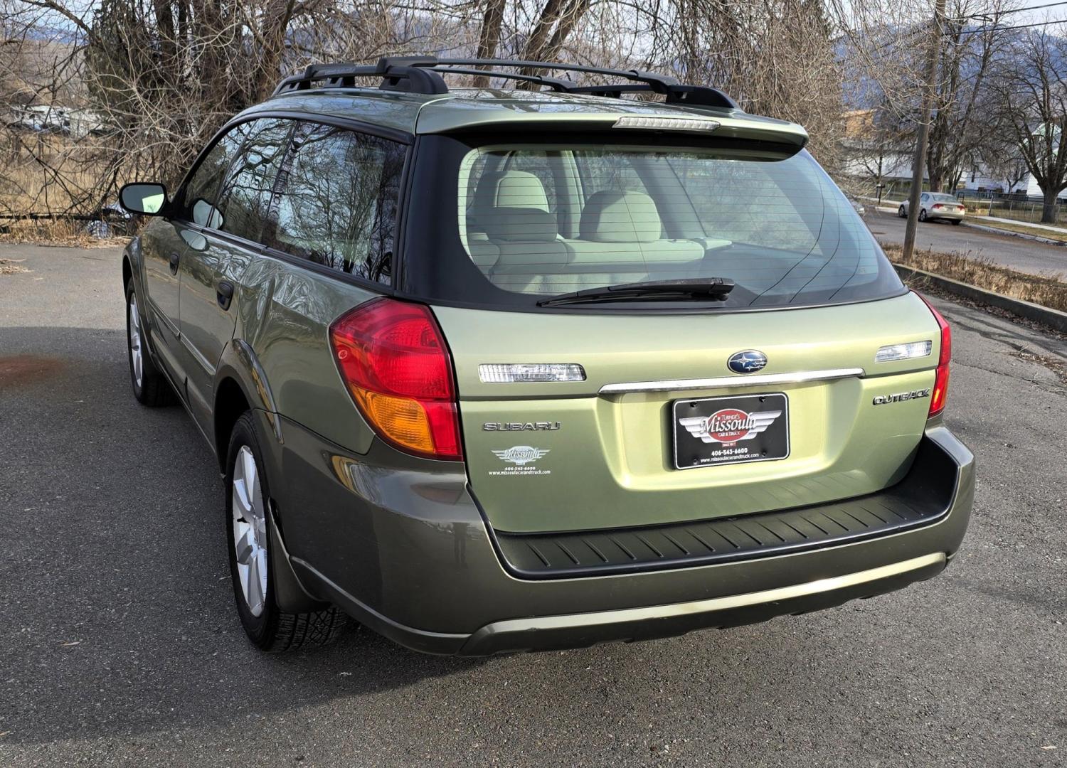 2006 Green /Tan Subaru Outback 2.5i Wagon (4S4BP61C667) with an 2.5L H4 SOHC 16V engine, 4-Speed Automatic Overdrive transmission, located at 450 N Russell, Missoula, MT, 59801, (406) 543-6600, 46.874496, -114.017433 - Sharp little AWD Suby. 2.5L H4 Engine. Automatic Transmission. All the maintenance that a Subaru needs. New Timing Belt. New Water Pump. New Head Gasket. Very Quiet. Firestone Tires in great condition. Heated front Seats. Air. Cruise. Tilt. Power Windows and Locks. Very Clean. Has a couple small den - Photo#6
