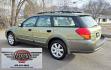 2006 Green /Tan Subaru Outback 2.5i Wagon (4S4BP61C667) with an 2.5L H4 SOHC 16V engine, 4-Speed Automatic Overdrive transmission, located at 450 N Russell, Missoula, MT, 59801, (406) 543-6600, 46.874496, -114.017433 - Sharp little AWD Suby. 2.5L H4 Engine. Automatic Transmission. All the maintenance that a Subaru needs. New Timing Belt. New Water Pump. New Head Gasket. Very Quiet. Firestone Tires in great condition. Heated front Seats. Air. Cruise. Tilt. Power Windows and Locks. Very Clean. Has a couple small den - Photo#5