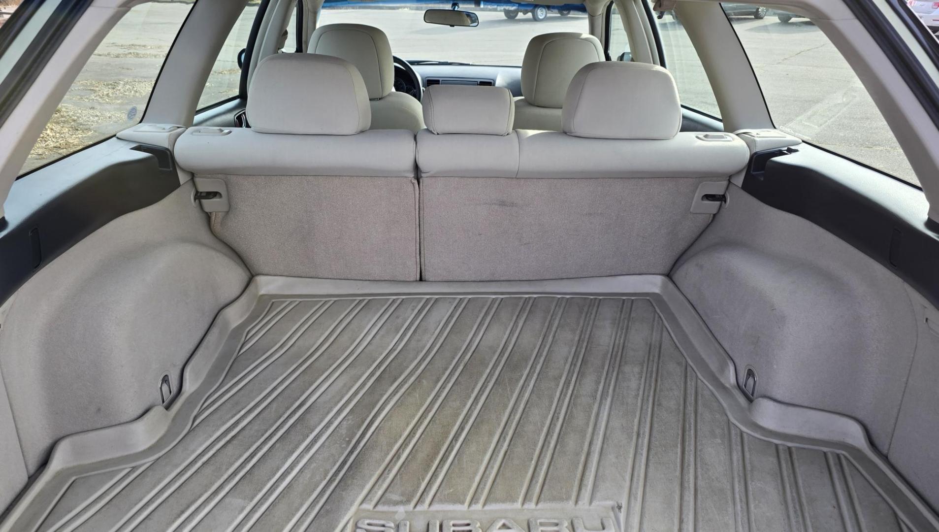 2006 Green /Tan Subaru Outback 2.5i Wagon (4S4BP61C667) with an 2.5L H4 SOHC 16V engine, 4-Speed Automatic Overdrive transmission, located at 450 N Russell, Missoula, MT, 59801, (406) 543-6600, 46.874496, -114.017433 - Sharp little AWD Suby. 2.5L H4 Engine. Automatic Transmission. All the maintenance that a Subaru needs. New Timing Belt. New Water Pump. New Head Gasket. Very Quiet. Firestone Tires in great condition. Heated front Seats. Air. Cruise. Tilt. Power Windows and Locks. Very Clean. Has a couple small den - Photo#8