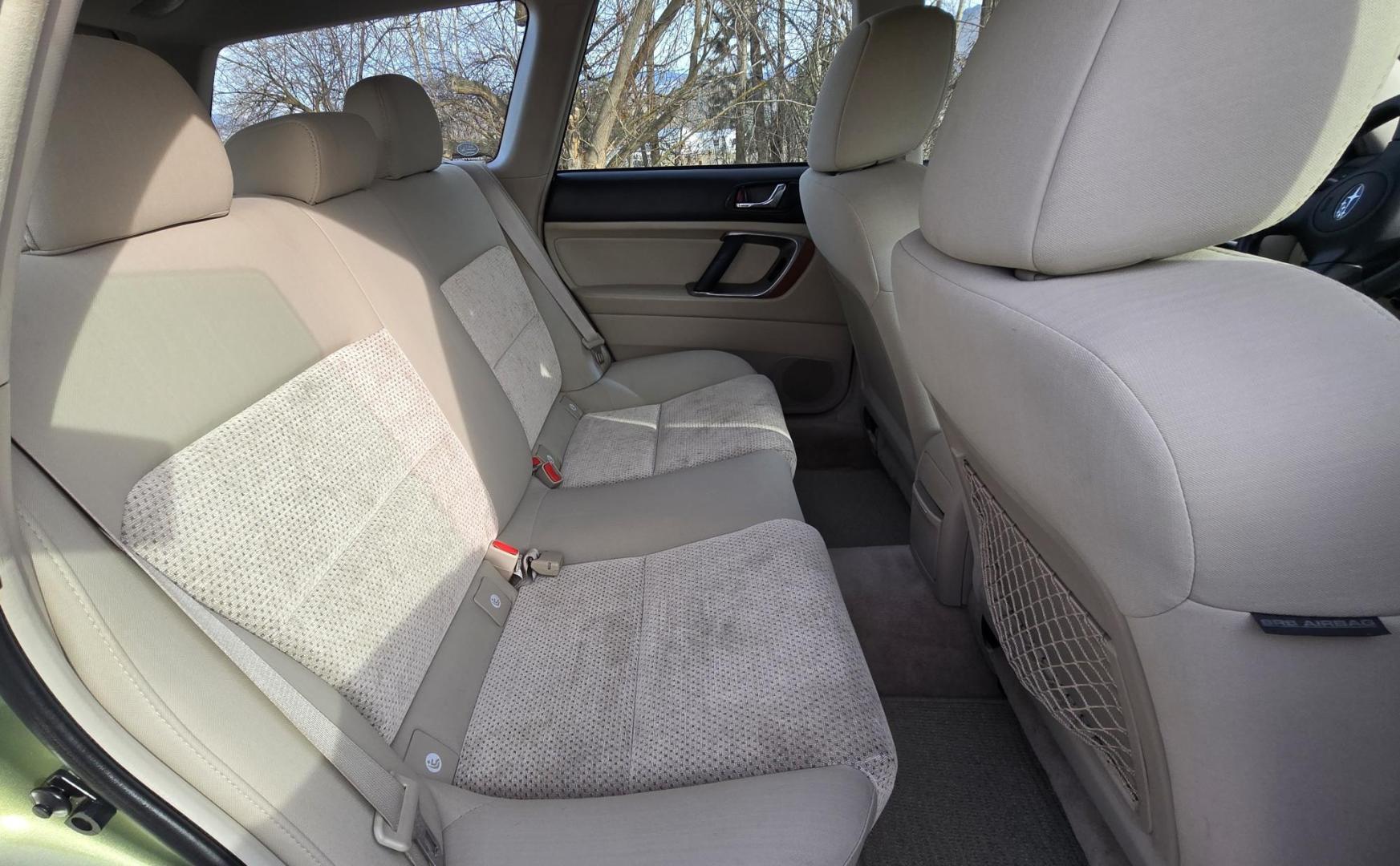 2006 Green /Tan Subaru Outback 2.5i Wagon (4S4BP61C667) with an 2.5L H4 SOHC 16V engine, 4-Speed Automatic Overdrive transmission, located at 450 N Russell, Missoula, MT, 59801, (406) 543-6600, 46.874496, -114.017433 - Sharp little AWD Suby. 2.5L H4 Engine. Automatic Transmission. All the maintenance that a Subaru needs. New Timing Belt. New Water Pump. New Head Gasket. Very Quiet. Firestone Tires in great condition. Heated front Seats. Air. Cruise. Tilt. Power Windows and Locks. Very Clean. Has a couple small den - Photo#9