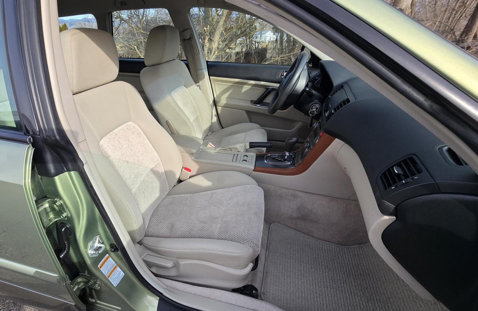 2006 Green /Tan Subaru Outback 2.5i Wagon (4S4BP61C667) with an 2.5L H4 SOHC 16V engine, 4-Speed Automatic Overdrive transmission, located at 450 N Russell, Missoula, MT, 59801, (406) 543-6600, 46.874496, -114.017433 - Sharp little AWD Suby. 2.5L H4 Engine. Automatic Transmission. All the maintenance that a Subaru needs. New Timing Belt. New Water Pump. New Head Gasket. Very Quiet. Firestone Tires in great condition. Heated front Seats. Air. Cruise. Tilt. Power Windows and Locks. Very Clean. Has a couple small den - Photo#10