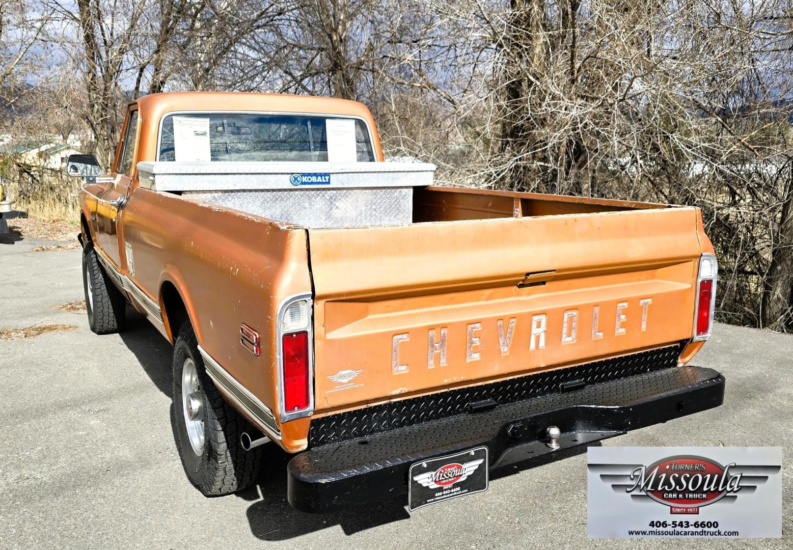 1971 Orange /Black Chevrolet C20 Custom Deluxe Custom Deluxe (CE241Z65340) with an 350 V8 engine, Automatic transmission, located at 450 N Russell, Missoula, MT, 59801, (406) 543-6600, 46.874496, -114.017433 - We find some rare birds but this may take the cake. 1971 Chevy 3/4 Ton Four Wheel Drive. 350 V8 Engine that runs fantastic and starts right up even in the cold weather. Automatic Transmission. Long Bed. Locking Warn Hubs. Nice Wheels and Tires. Dual Gas Tanks. Interior could use some restoration bu - Photo#6