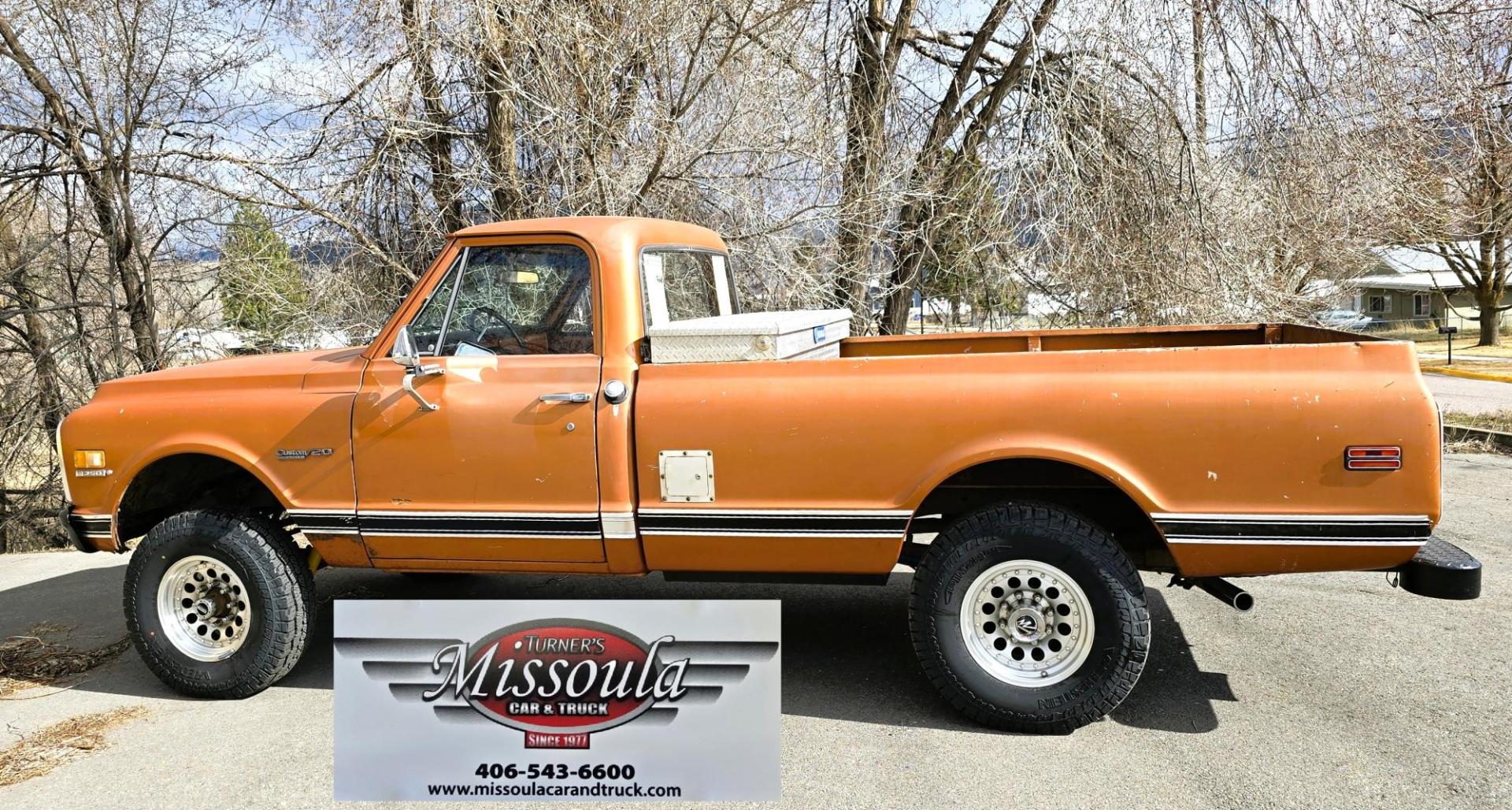 1971 Orange /Black Chevrolet C20 Custom Deluxe Custom Deluxe (CE241Z65340) with an 350 V8 engine, Automatic transmission, located at 450 N Russell, Missoula, MT, 59801, (406) 543-6600, 46.874496, -114.017433 - We find some rare birds but this may take the cake. 1971 Chevy 3/4 Ton Four Wheel Drive. 350 V8 Engine that runs fantastic and starts right up even in the cold weather. Automatic Transmission. Long Bed. Locking Warn Hubs. Nice Wheels and Tires. Dual Gas Tanks. Interior could use some restoration bu - Photo#2
