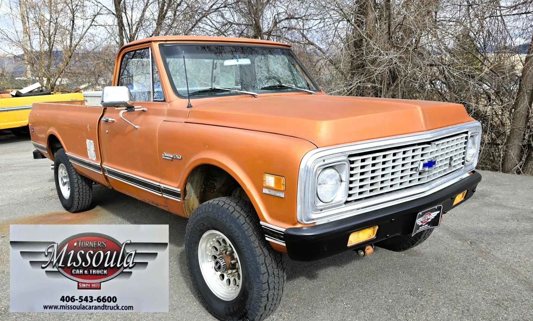 1971 Orange /Black Chevrolet C20 Custom Deluxe Custom Deluxe (CE241Z65340) with an 350 V8 engine, Automatic transmission, located at 450 N Russell, Missoula, MT, 59801, (406) 543-6600, 46.874496, -114.017433 - We find some rare birds but this may take the cake. 1971 Chevy 3/4 Ton Four Wheel Drive. 350 V8 Engine that runs fantastic and starts right up even in the cold weather. Automatic Transmission. Long Bed. Locking Warn Hubs. Nice Wheels and Tires. Dual Gas Tanks. Interior could use some restoration bu - Photo#4
