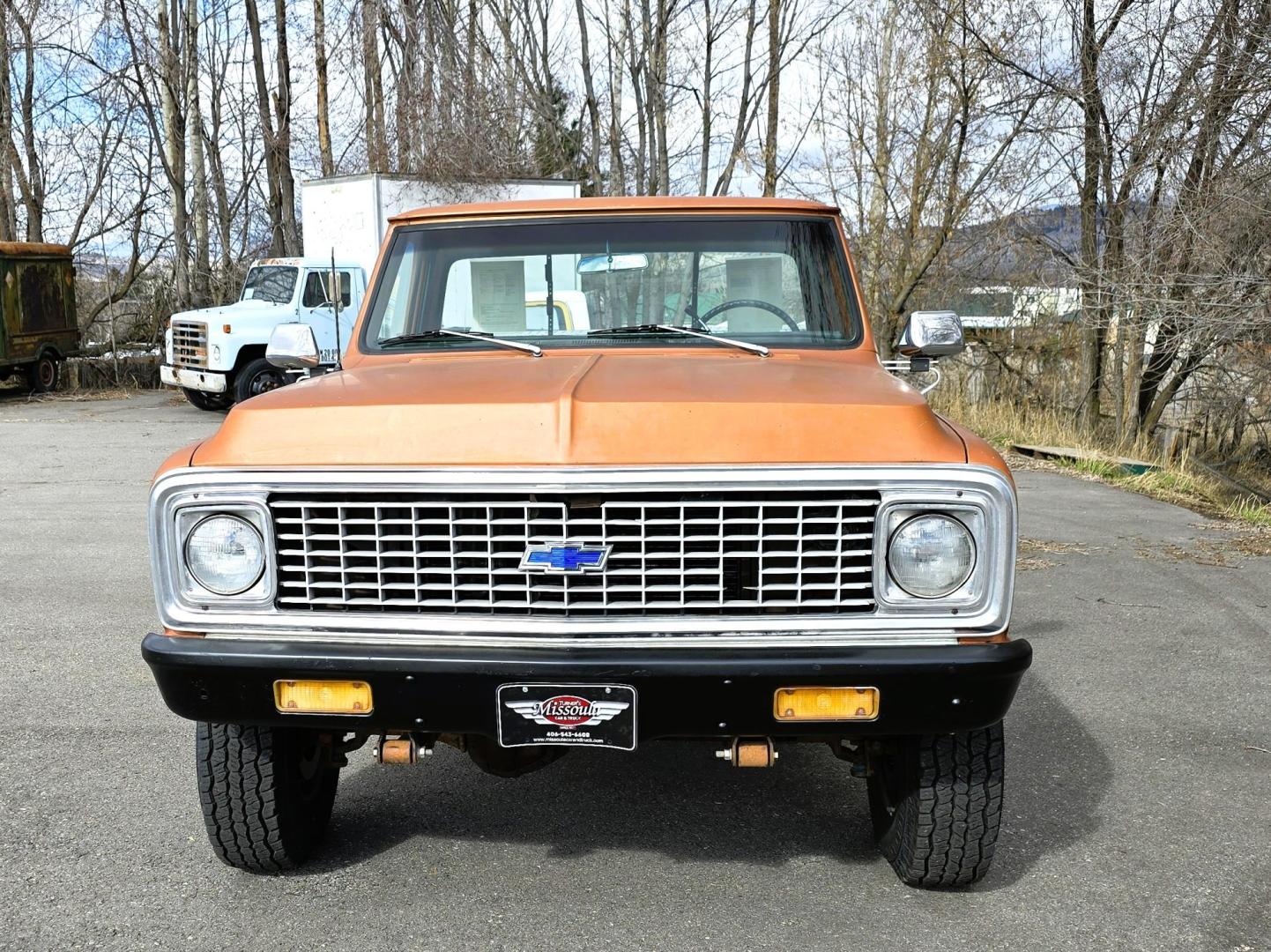 1971 Orange /Black Chevrolet C20 Custom Deluxe Custom Deluxe (CE241Z65340) with an 350 V8 engine, Automatic transmission, located at 450 N Russell, Missoula, MT, 59801, (406) 543-6600, 46.874496, -114.017433 - We find some rare birds but this may take the cake. 1971 Chevy 3/4 Ton Four Wheel Drive. 350 V8 Engine that runs fantastic and starts right up even in the cold weather. Automatic Transmission. Long Bed. Locking Warn Hubs. Nice Wheels and Tires. Dual Gas Tanks. Interior could use some restoration bu - Photo#7