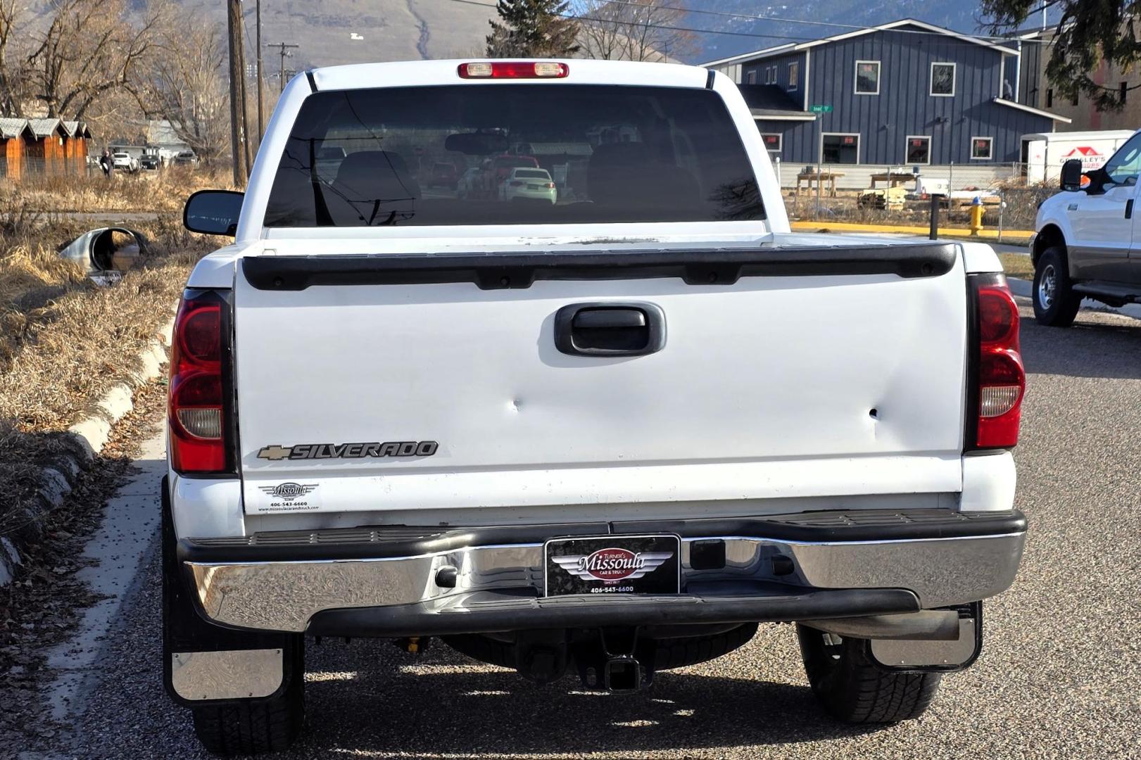 2006 White /Gray Chevrolet Silverado 1500 LS Ext. Cab 4WD (1GCEK19B46Z) with an 5.3L V8 OHV 16V engine, 4-Speed Automatic Overdrive transmission, located at 450 N Russell, Missoula, MT, 59801, (406) 543-6600, 46.874496, -114.017433 - 2006 Silverado 4WD. 5.3L V8 Engine. Automatic Transmission. Air Cruise. Tilt. Power Windows and Locks. Power Drivers Seat. The state of Montana misprinted the miles on the title when the truck came in from Canada so it has a Branded Title. The Miles are correct and do not exceed mechanical limits - Photo#4