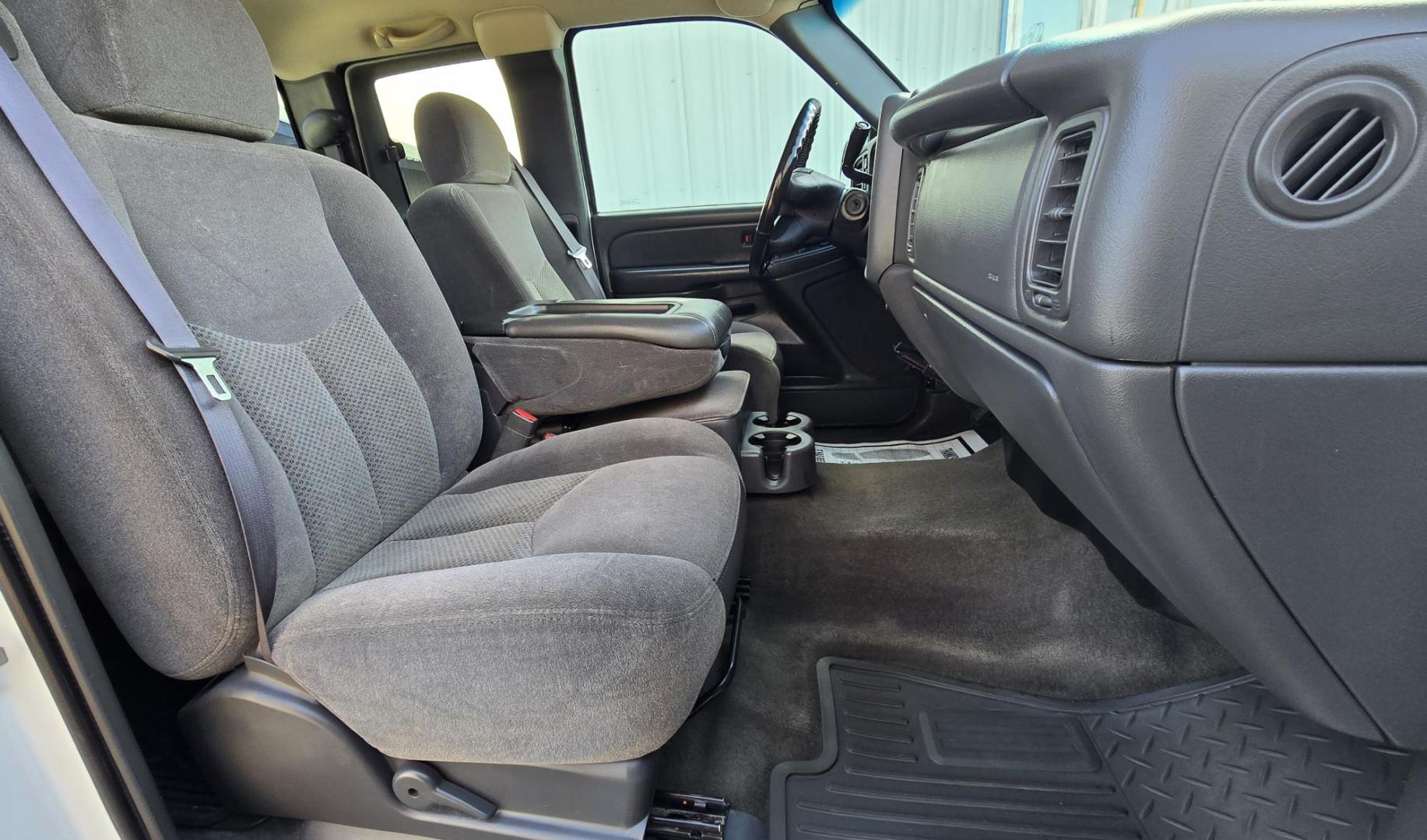 2006 White /Gray Chevrolet Silverado 1500 LS Ext. Cab 4WD (1GCEK19B46Z) with an 5.3L V8 OHV 16V engine, 4-Speed Automatic Overdrive transmission, located at 450 N Russell, Missoula, MT, 59801, (406) 543-6600, 46.874496, -114.017433 - 2006 Silverado 4WD. 5.3L V8 Engine. Automatic Transmission. Air Cruise. Tilt. Power Windows and Locks. Power Drivers Seat. The state of Montana misprinted the miles on the title when the truck came in from Canada so it has a Branded Title. The Miles are correct and do not exceed mechanical limits - Photo#16