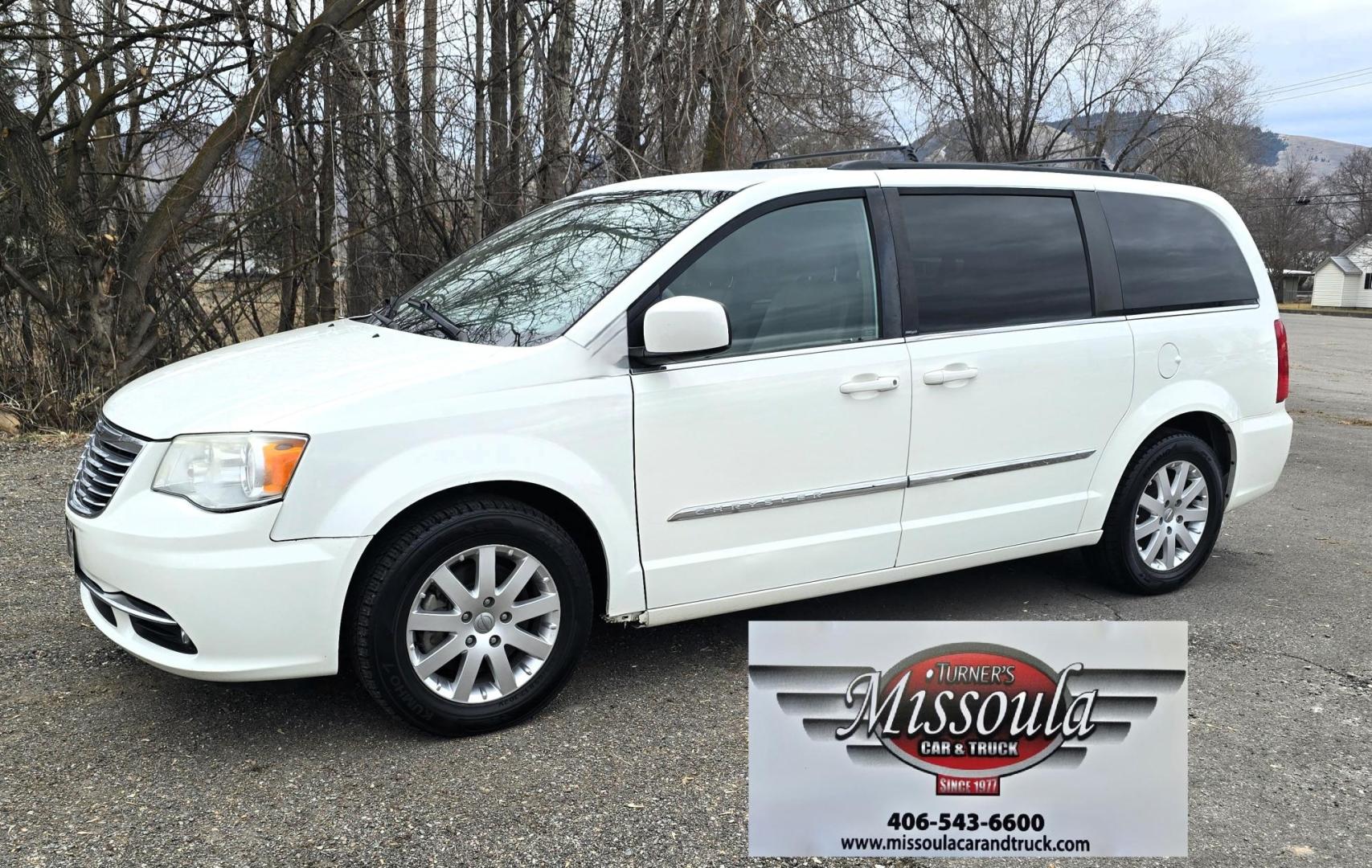 2013 White /Tan Chrysler Town & Country Touring (2C4RC1BG8DR) with an 3.6L V6 DOHC 24V engine, 6-Speed Automatic transmission, located at 450 N Russell, Missoula, MT, 59801, (406) 543-6600, 46.874496, -114.017433 - Excellent Condition Town and Country. 3.6L V6 Engine. Automatic Transmission. 3rd Row Seating. DVD Player. Air. Cruise. Tilt. Rear Climate Control. Power Windows. Power Locks. Power Remote Rear Doors. AM FM XM Bluetooth. Good Tires. 2 Owner with a Clean Title and Carfax. Front Wheel Drive. We Fin - Photo#0