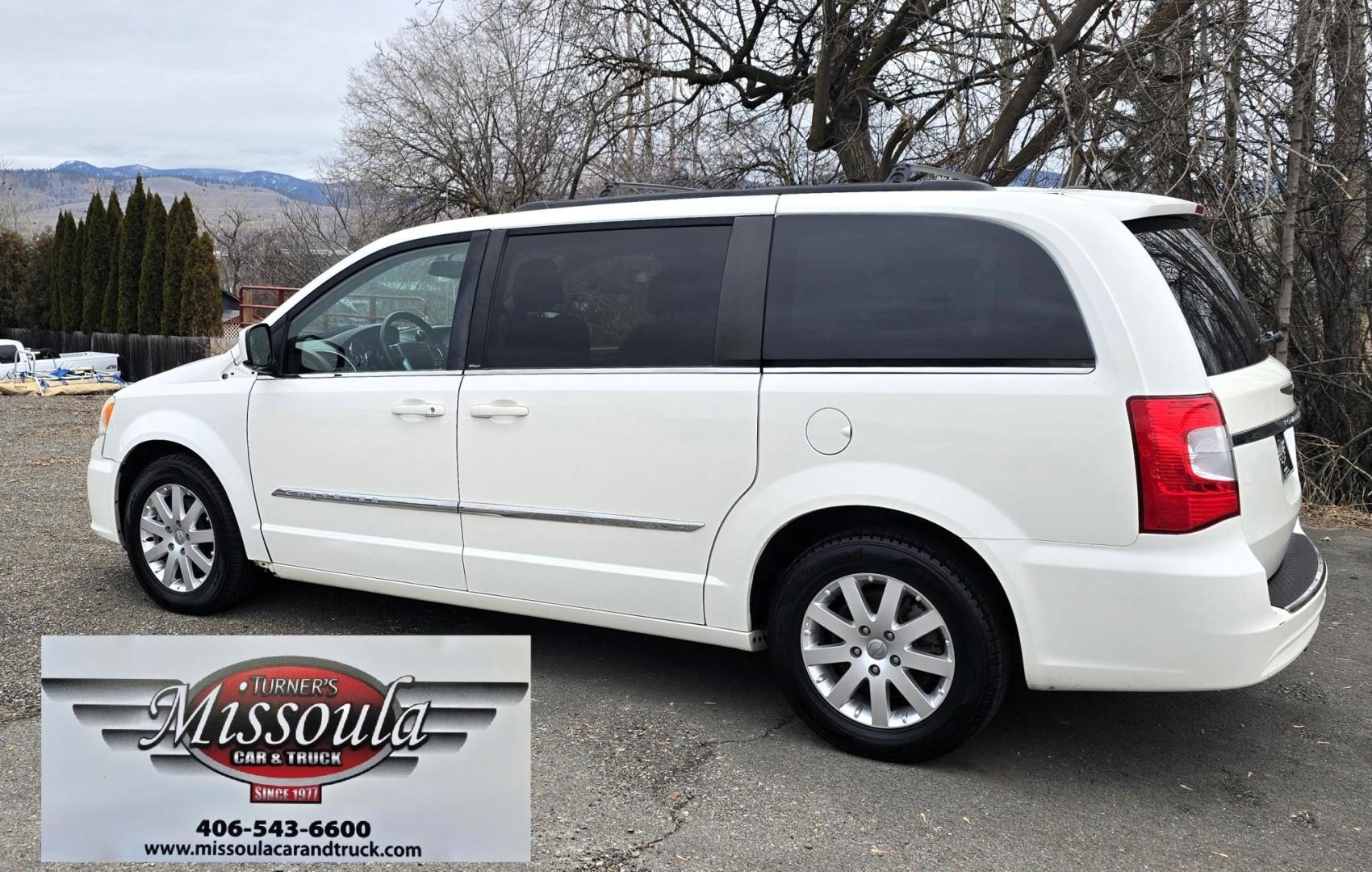 2013 White /Tan Chrysler Town & Country Touring (2C4RC1BG8DR) with an 3.6L V6 DOHC 24V engine, 6-Speed Automatic transmission, located at 450 N Russell, Missoula, MT, 59801, (406) 543-6600, 46.874496, -114.017433 - Excellent Condition Town and Country. 3.6L V6 Engine. Automatic Transmission. 3rd Row Seating. DVD Player. Air. Cruise. Tilt. Rear Climate Control. Power Windows. Power Locks. Power Remote Rear Doors. AM FM XM Bluetooth. Good Tires. 2 Owner with a Clean Title and Carfax. Front Wheel Drive. We Fin - Photo#2