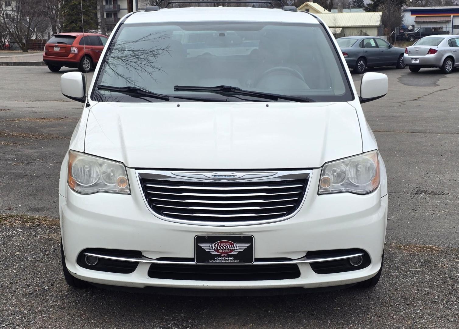 2013 White /Tan Chrysler Town & Country Touring (2C4RC1BG8DR) with an 3.6L V6 DOHC 24V engine, 6-Speed Automatic transmission, located at 450 N Russell, Missoula, MT, 59801, (406) 543-6600, 46.874496, -114.017433 - Excellent Condition Town and Country. 3.6L V6 Engine. Automatic Transmission. 3rd Row Seating. DVD Player. Air. Cruise. Tilt. Rear Climate Control. Power Windows. Power Locks. Power Remote Rear Doors. AM FM XM Bluetooth. Good Tires. 2 Owner with a Clean Title and Carfax. Front Wheel Drive. We Fin - Photo#4