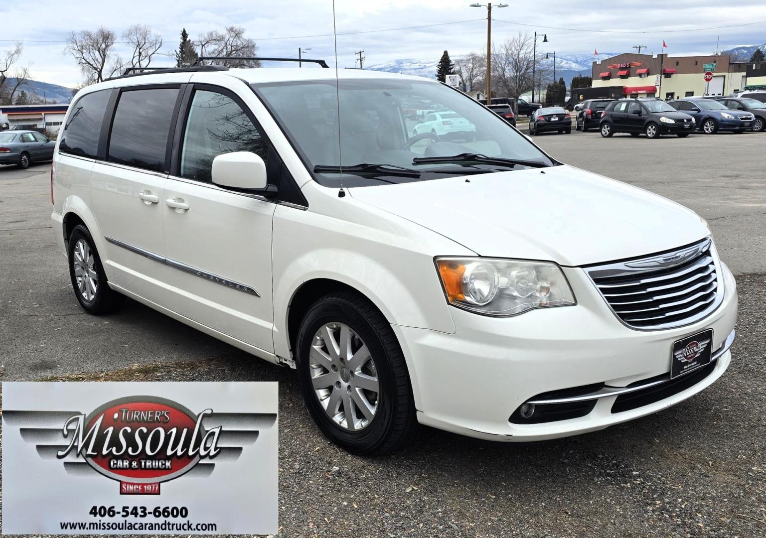 2013 White /Tan Chrysler Town & Country Touring (2C4RC1BG8DR) with an 3.6L V6 DOHC 24V engine, 6-Speed Automatic transmission, located at 450 N Russell, Missoula, MT, 59801, (406) 543-6600, 46.874496, -114.017433 - Excellent Condition Town and Country. 3.6L V6 Engine. Automatic Transmission. 3rd Row Seating. DVD Player. Air. Cruise. Tilt. Rear Climate Control. Power Windows. Power Locks. Power Remote Rear Doors. AM FM XM Bluetooth. Good Tires. 2 Owner with a Clean Title and Carfax. Front Wheel Drive. We Fin - Photo#5
