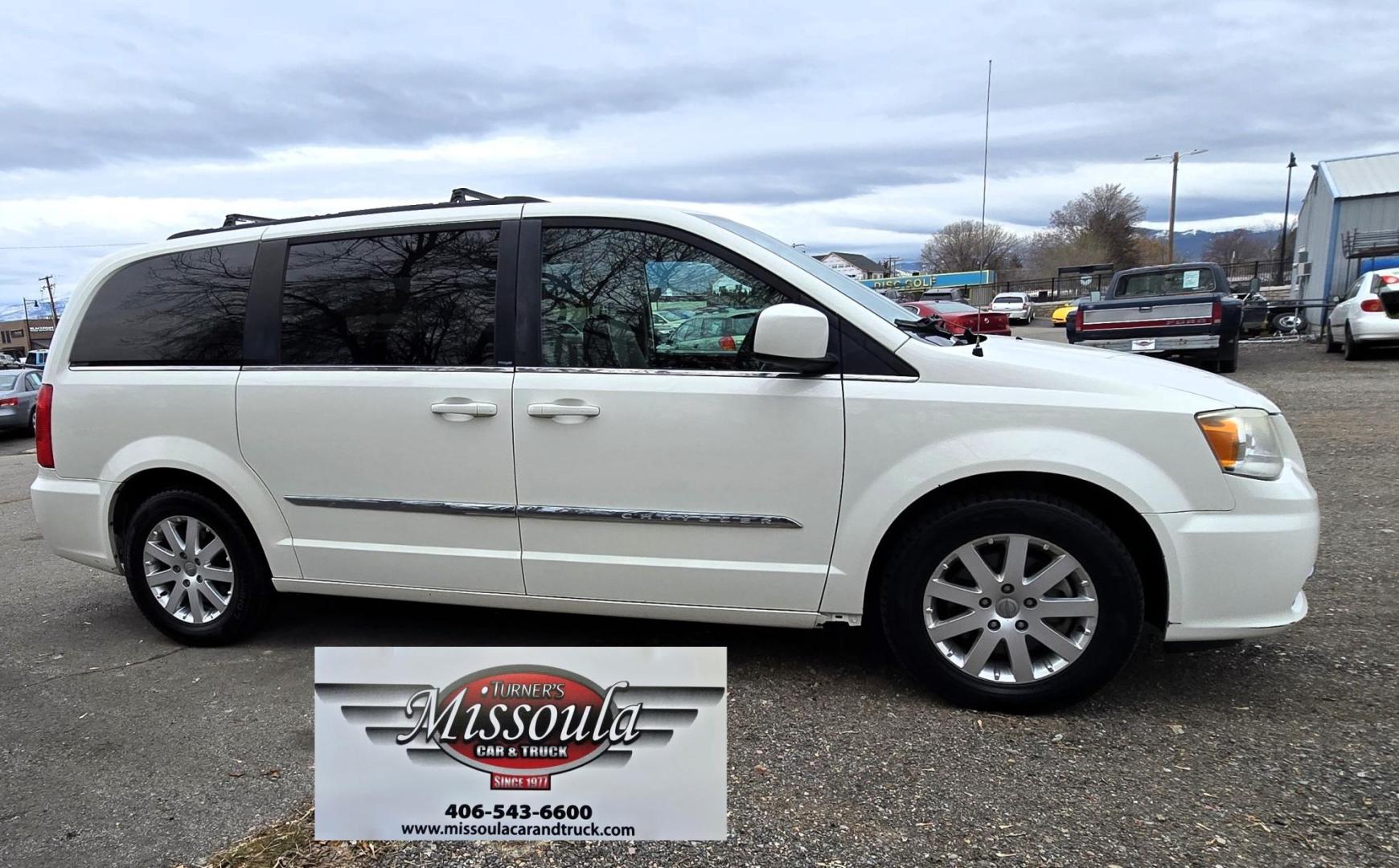 2013 White /Tan Chrysler Town & Country Touring (2C4RC1BG8DR) with an 3.6L V6 DOHC 24V engine, 6-Speed Automatic transmission, located at 450 N Russell, Missoula, MT, 59801, (406) 543-6600, 46.874496, -114.017433 - Excellent Condition Town and Country. 3.6L V6 Engine. Automatic Transmission. 3rd Row Seating. DVD Player. Air. Cruise. Tilt. Rear Climate Control. Power Windows. Power Locks. Power Remote Rear Doors. AM FM XM Bluetooth. Good Tires. 2 Owner with a Clean Title and Carfax. Front Wheel Drive. We Fin - Photo#6