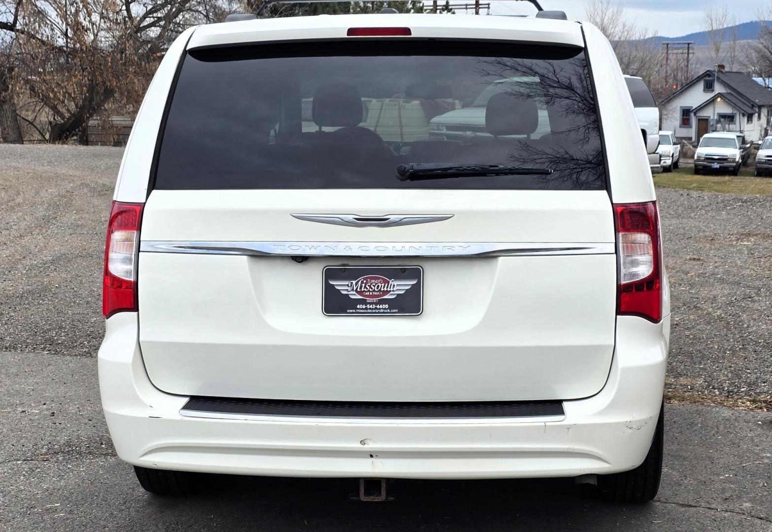 2013 White /Tan Chrysler Town & Country Touring (2C4RC1BG8DR) with an 3.6L V6 DOHC 24V engine, 6-Speed Automatic transmission, located at 450 N Russell, Missoula, MT, 59801, (406) 543-6600, 46.874496, -114.017433 - Excellent Condition Town and Country. 3.6L V6 Engine. Automatic Transmission. 3rd Row Seating. DVD Player. Air. Cruise. Tilt. Rear Climate Control. Power Windows. Power Locks. Power Remote Rear Doors. AM FM XM Bluetooth. Good Tires. 2 Owner with a Clean Title and Carfax. Front Wheel Drive. We Fin - Photo#7