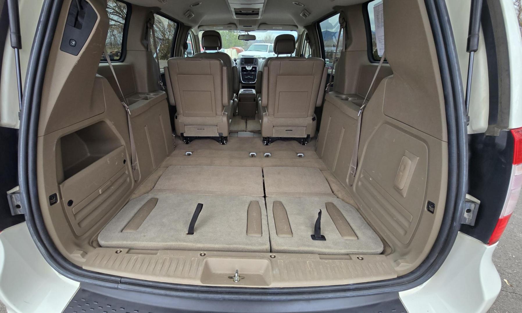 2013 White /Tan Chrysler Town & Country Touring (2C4RC1BG8DR) with an 3.6L V6 DOHC 24V engine, 6-Speed Automatic transmission, located at 450 N Russell, Missoula, MT, 59801, (406) 543-6600, 46.874496, -114.017433 - Excellent Condition Town and Country. 3.6L V6 Engine. Automatic Transmission. 3rd Row Seating. DVD Player. Air. Cruise. Tilt. Rear Climate Control. Power Windows. Power Locks. Power Remote Rear Doors. AM FM XM Bluetooth. Good Tires. 2 Owner with a Clean Title and Carfax. Front Wheel Drive. We Fin - Photo#9