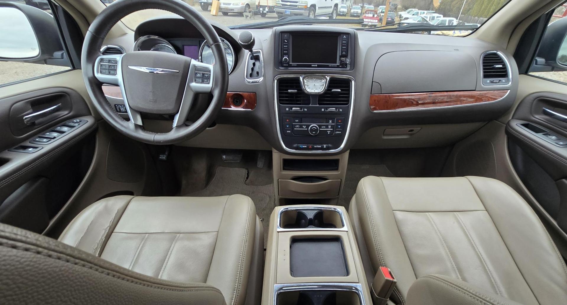 2013 White /Tan Chrysler Town & Country Touring (2C4RC1BG8DR) with an 3.6L V6 DOHC 24V engine, 6-Speed Automatic transmission, located at 450 N Russell, Missoula, MT, 59801, (406) 543-6600, 46.874496, -114.017433 - Excellent Condition Town and Country. 3.6L V6 Engine. Automatic Transmission. 3rd Row Seating. DVD Player. Air. Cruise. Tilt. Rear Climate Control. Power Windows. Power Locks. Power Remote Rear Doors. AM FM XM Bluetooth. Good Tires. 2 Owner with a Clean Title and Carfax. Front Wheel Drive. We Fin - Photo#11