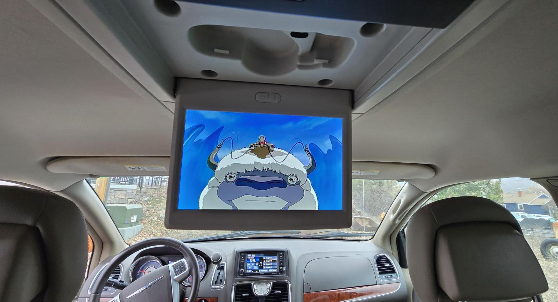 2013 White /Tan Chrysler Town & Country Touring (2C4RC1BG8DR) with an 3.6L V6 DOHC 24V engine, 6-Speed Automatic transmission, located at 450 N Russell, Missoula, MT, 59801, (406) 543-6600, 46.874496, -114.017433 - Excellent Condition Town and Country. 3.6L V6 Engine. Automatic Transmission. 3rd Row Seating. DVD Player. Air. Cruise. Tilt. Rear Climate Control. Power Windows. Power Locks. Power Remote Rear Doors. AM FM XM Bluetooth. Good Tires. 2 Owner with a Clean Title and Carfax. Front Wheel Drive. We Fin - Photo#16