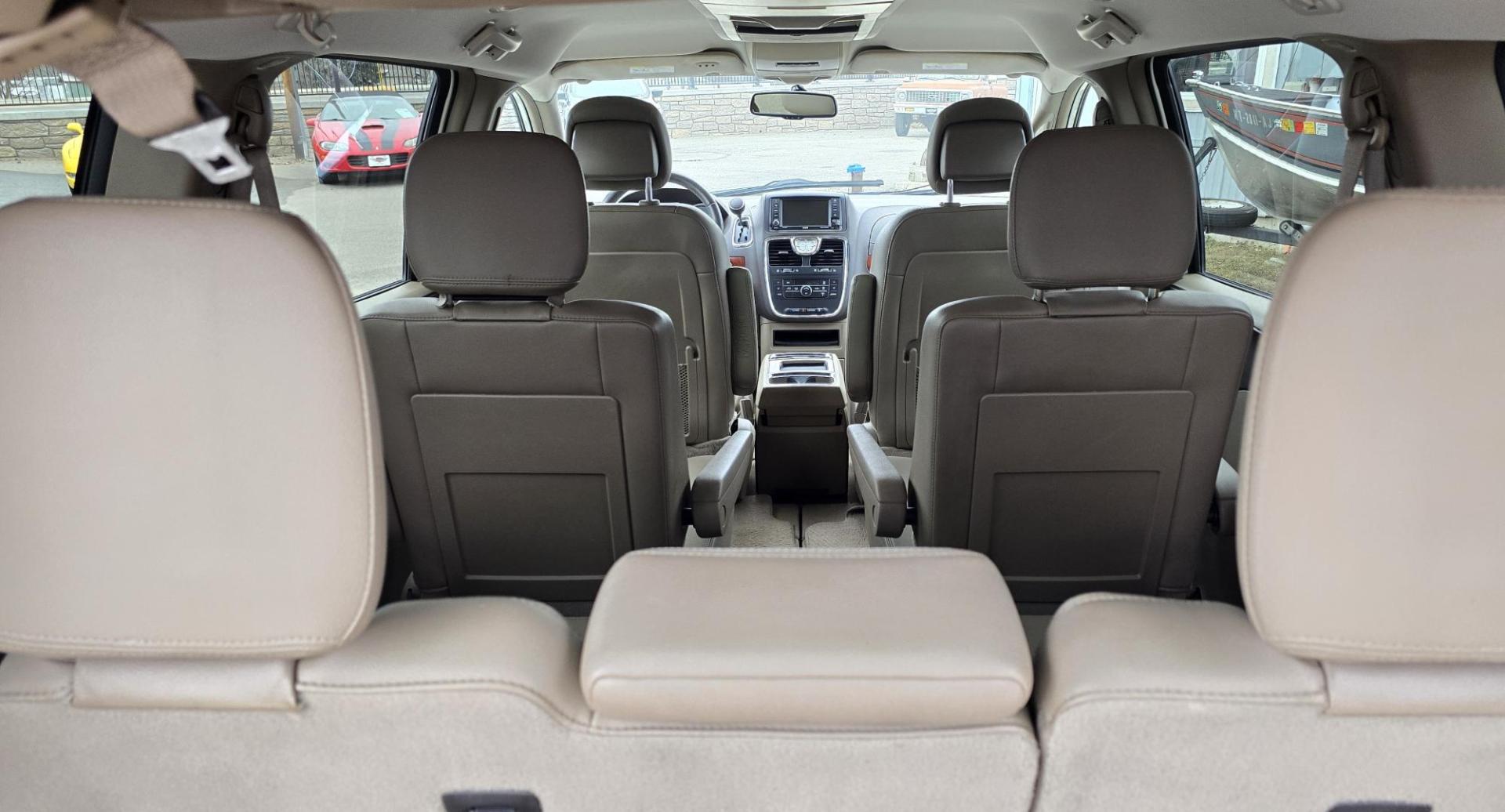 2013 White /Tan Chrysler Town & Country Touring (2C4RC1BG8DR) with an 3.6L V6 DOHC 24V engine, 6-Speed Automatic transmission, located at 450 N Russell, Missoula, MT, 59801, (406) 543-6600, 46.874496, -114.017433 - Excellent Condition Town and Country. 3.6L V6 Engine. Automatic Transmission. 3rd Row Seating. DVD Player. Air. Cruise. Tilt. Rear Climate Control. Power Windows. Power Locks. Power Remote Rear Doors. AM FM XM Bluetooth. Good Tires. 2 Owner with a Clean Title and Carfax. Front Wheel Drive. We Fin - Photo#19