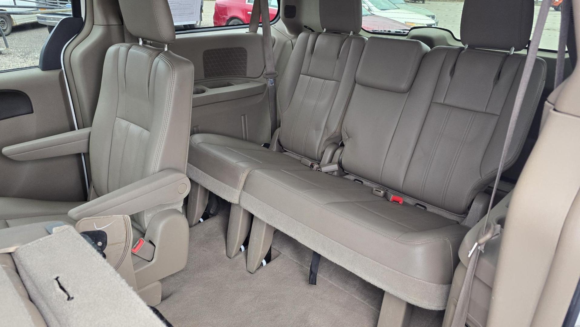 2013 White /Tan Chrysler Town & Country Touring (2C4RC1BG8DR) with an 3.6L V6 DOHC 24V engine, 6-Speed Automatic transmission, located at 450 N Russell, Missoula, MT, 59801, (406) 543-6600, 46.874496, -114.017433 - Excellent Condition Town and Country. 3.6L V6 Engine. Automatic Transmission. 3rd Row Seating. DVD Player. Air. Cruise. Tilt. Rear Climate Control. Power Windows. Power Locks. Power Remote Rear Doors. AM FM XM Bluetooth. Good Tires. 2 Owner with a Clean Title and Carfax. Front Wheel Drive. We Fin - Photo#20