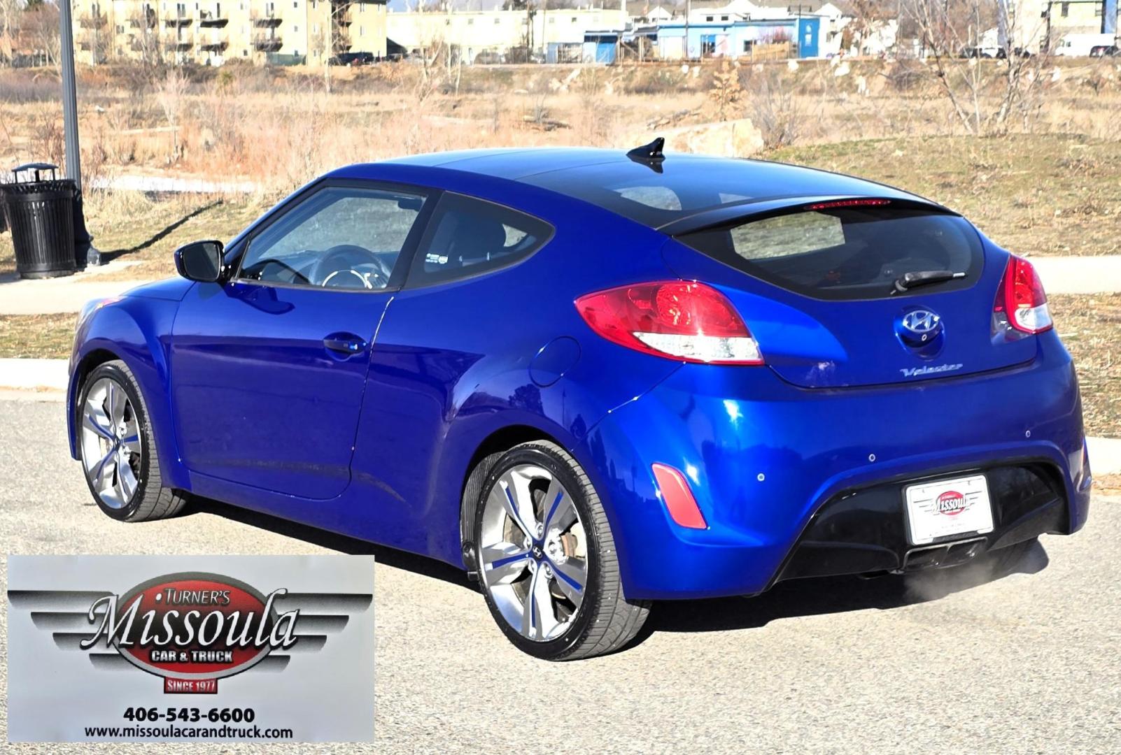 2013 Blue /Black Hyundai Veloster Base (KMHTC6AD8DU) with an 1.6L L4 DOHC 16V engine, Automatic transmission, located at 450 N Russell, Missoula, MT, 59801, (406) 543-6600, 46.874496, -114.017433 - Cute Little 3 Door FWD Coupe. 1.6L I4 Engine. Automatic Transmission. Navigation. Power Sunroof. Air. Cruise. Tilt. Power Windows and Locks. Bluetooth. Comes with an extra set of wheels with studded snow tires mounted. We Finance through local Credit Unions. We do NOT offer In House (Buy Here Pay - Photo#2