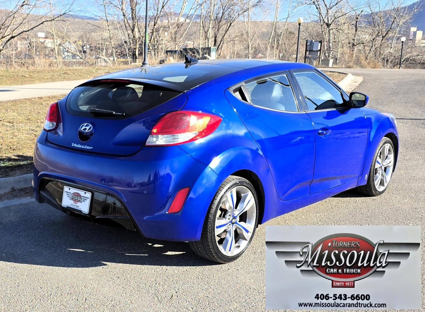 2013 Blue /Black Hyundai Veloster Base (KMHTC6AD8DU) with an 1.6L L4 DOHC 16V engine, Automatic transmission, located at 450 N Russell, Missoula, MT, 59801, (406) 543-6600, 46.874496, -114.017433 - Cute Little 3 Door FWD Coupe. 1.6L I4 Engine. Automatic Transmission. Navigation. Power Sunroof. Air. Cruise. Tilt. Power Windows and Locks. Bluetooth. Comes with an extra set of wheels with studded snow tires mounted. We Finance through local Credit Unions. We do NOT offer In House (Buy Here Pay - Photo#4