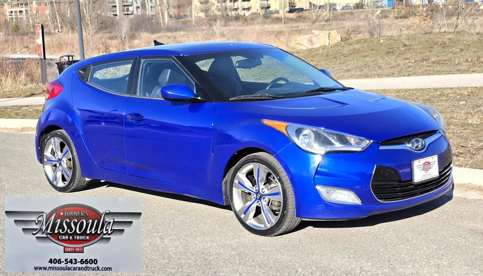 2013 Blue /Black Hyundai Veloster Base (KMHTC6AD8DU) with an 1.6L L4 DOHC 16V engine, Automatic transmission, located at 450 N Russell, Missoula, MT, 59801, (406) 543-6600, 46.874496, -114.017433 - Cute Little 3 Door FWD Coupe. 1.6L I4 Engine. Automatic Transmission. Navigation. Power Sunroof. Air. Cruise. Tilt. Power Windows and Locks. Bluetooth. Comes with an extra set of wheels with studded snow tires mounted. We Finance through local Credit Unions. We do NOT offer In House (Buy Here Pay - Photo#6