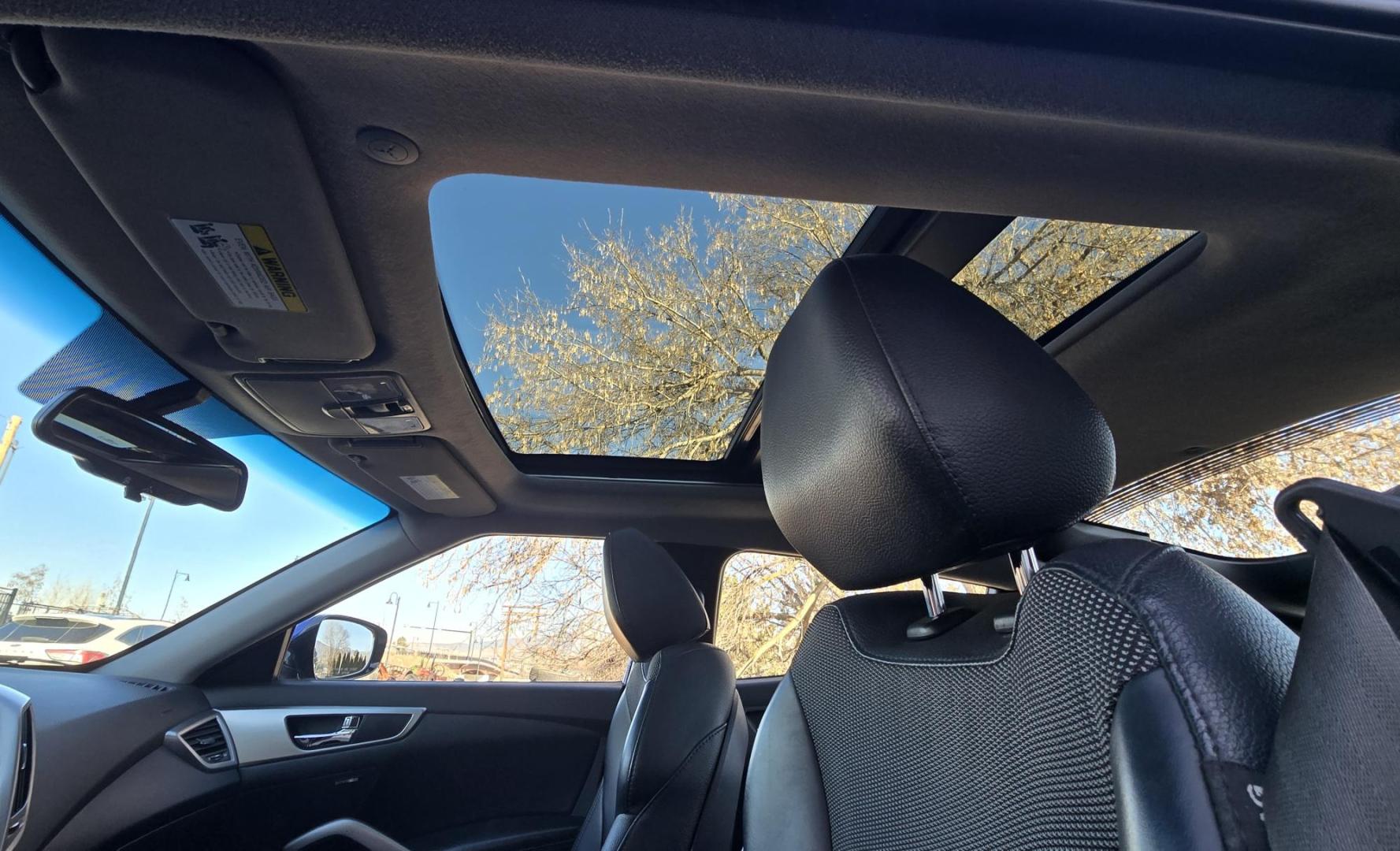 2013 Blue /Black Hyundai Veloster Base (KMHTC6AD8DU) with an 1.6L L4 DOHC 16V engine, Automatic transmission, located at 450 N Russell, Missoula, MT, 59801, (406) 543-6600, 46.874496, -114.017433 - Cute Little 3 Door FWD Coupe. 1.6L I4 Engine. Automatic Transmission. Navigation. Power Sunroof. Air. Cruise. Tilt. Power Windows and Locks. Bluetooth. Comes with an extra set of wheels with studded snow tires mounted. We Finance through local Credit Unions. We do NOT offer In House (Buy Here Pay - Photo#12