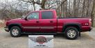 2004 Maroon /Tan Chevrolet Silverado 1500 LS Crew Cab 4WD (2GCEK13T741) with an 5.3L V8 OHV 16V engine, 4-Speed Automatic Overdrive transmission, located at 450 N Russell, Missoula, MT, 59801, (406) 543-6600, 46.874496, -114.017433 - Strong Running 4WD Chevy. 5.3L V8 Engine. Automatic Transmission. Heated Leather Power Front Seats. Rear DVD Player. Power Windows and Locks. AM FM CD Player.Running Boards. Has a check engine light saying there is a misfire but the truck runs great. Does have a Branded Title because the State of Mo - Photo#1